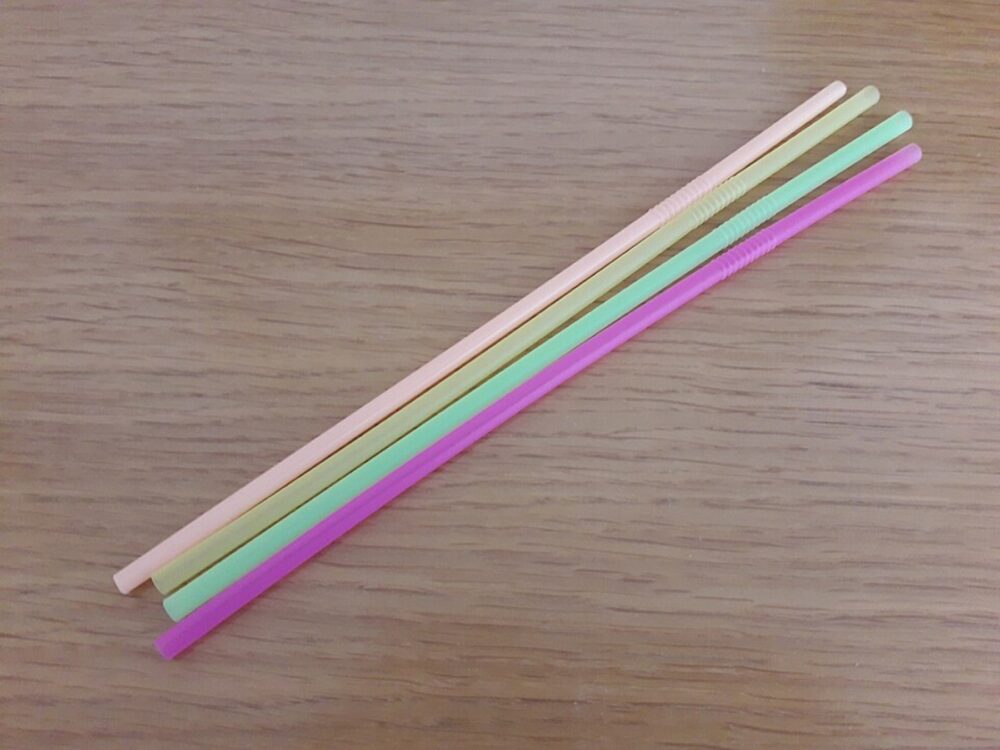Assorted coloured plastic straws illustrating different pack and color options
