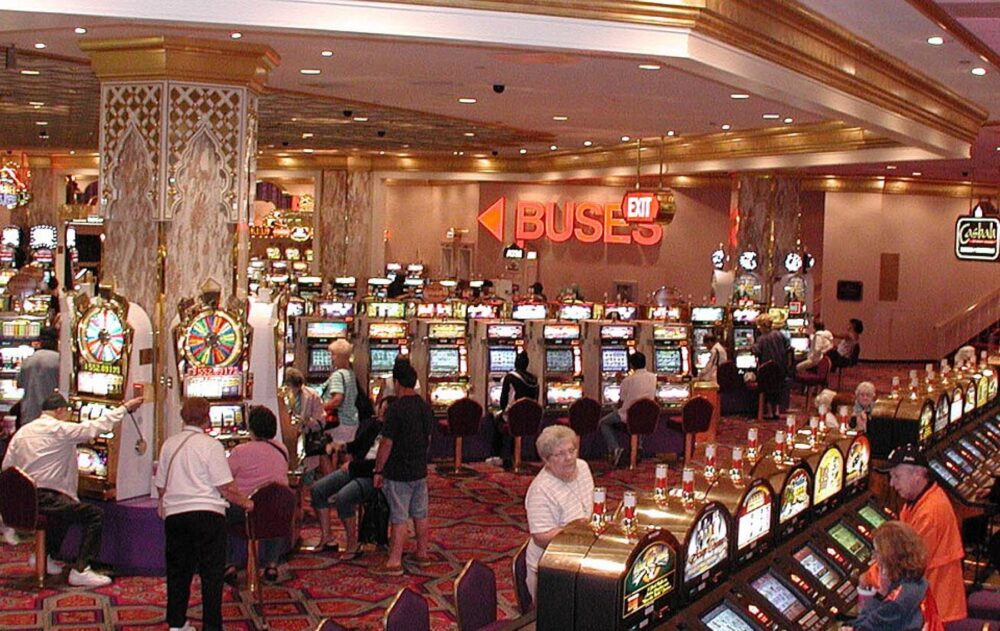 Rows of slot machines on a casino floor