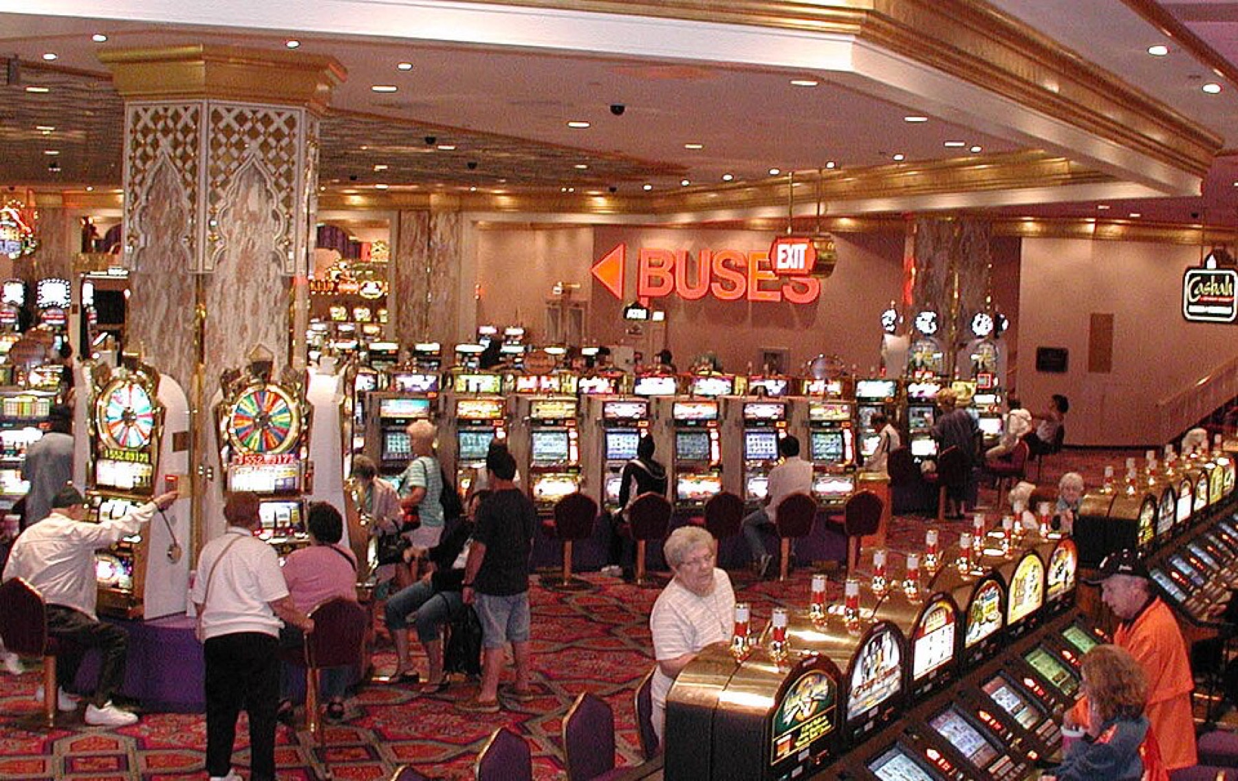 Rows of slot machines on a casino floor
