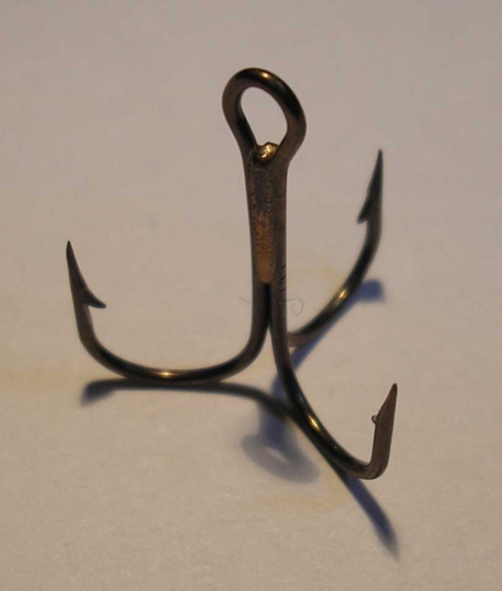 Close-up of a three-pronged treble fishing hook