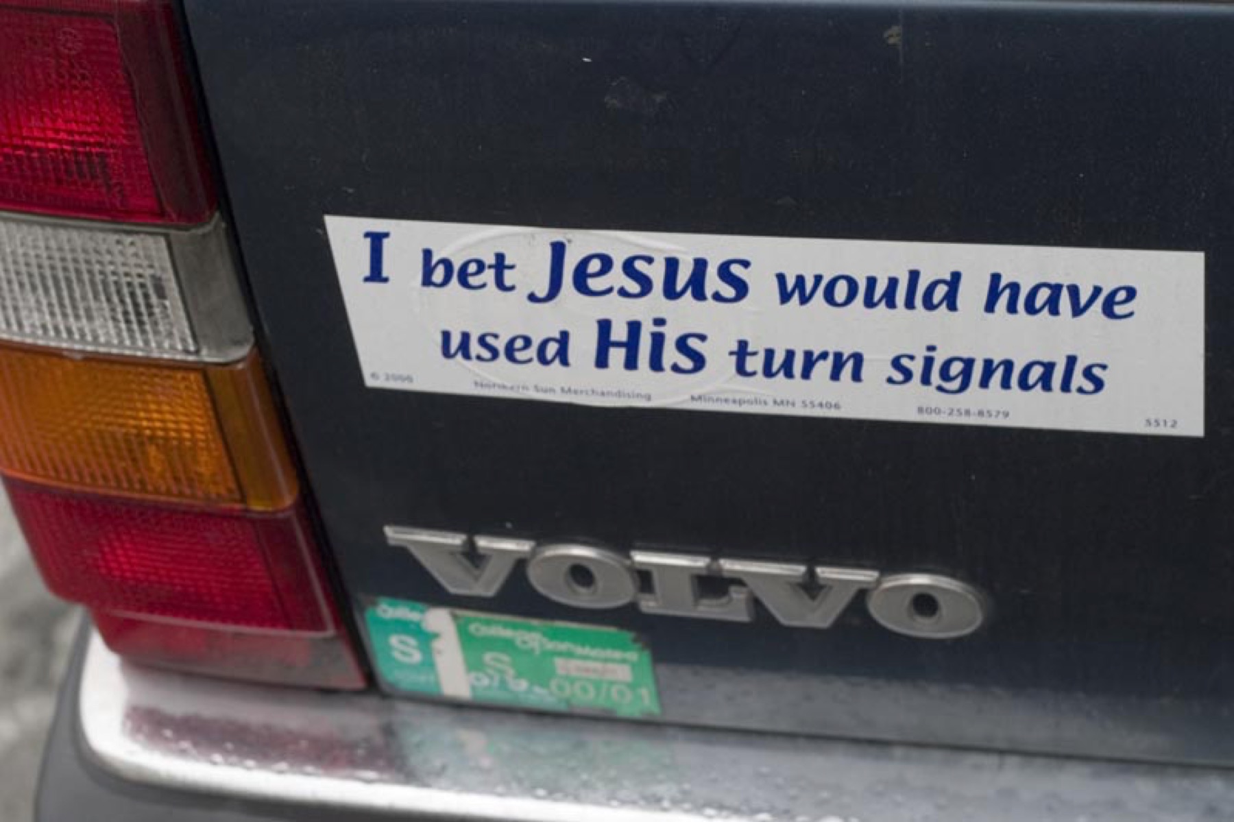 Christian bumper sticker on car rear bumper