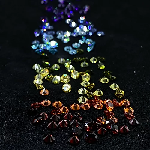 Assorted colorful resin gems similar to jelly and resin rhinestones