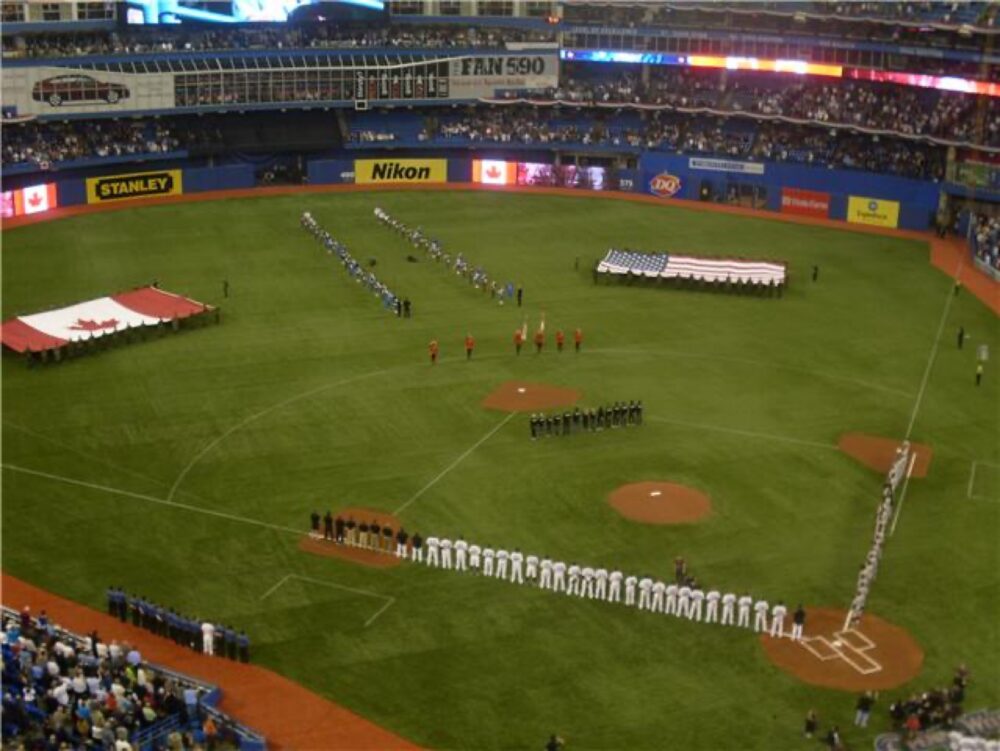 Toronto Blue Jays fans at a home game, illustrating demand for team-branded merchandise like blankets