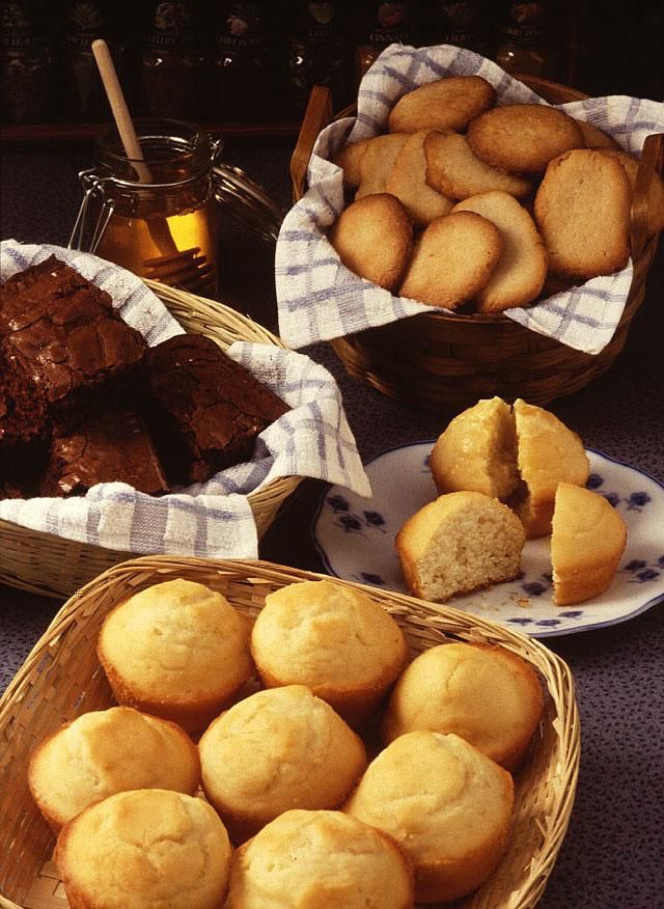 Assortment of baked goods in different pans and trays