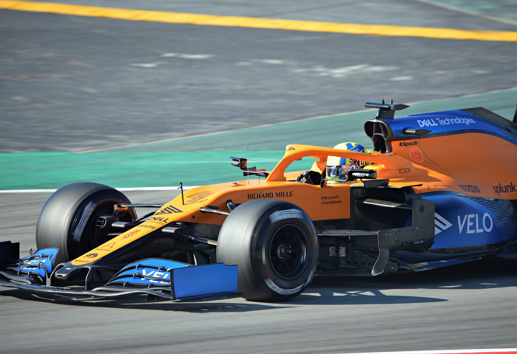 Lando Norris driving a McLaren F1 car, suitable as visual context for poster buyers