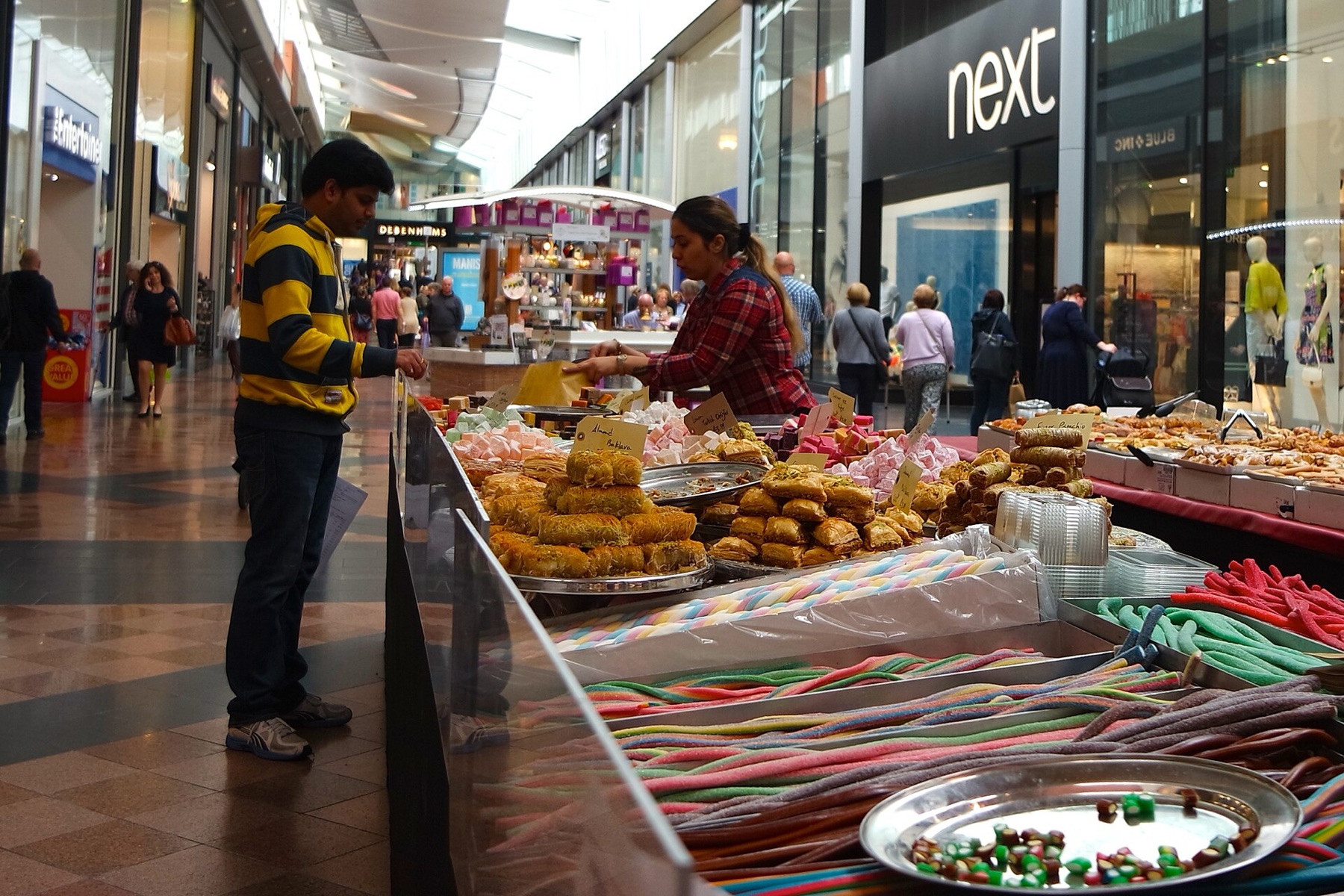 A physical market in Golden Square, Warrington, used only to illustrate the general marketplace concept