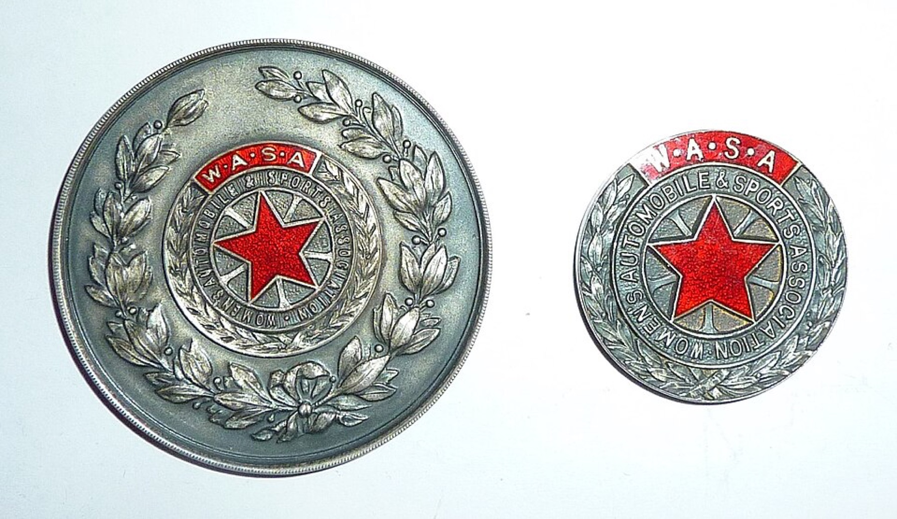 Vintage sports association medals showing front designs