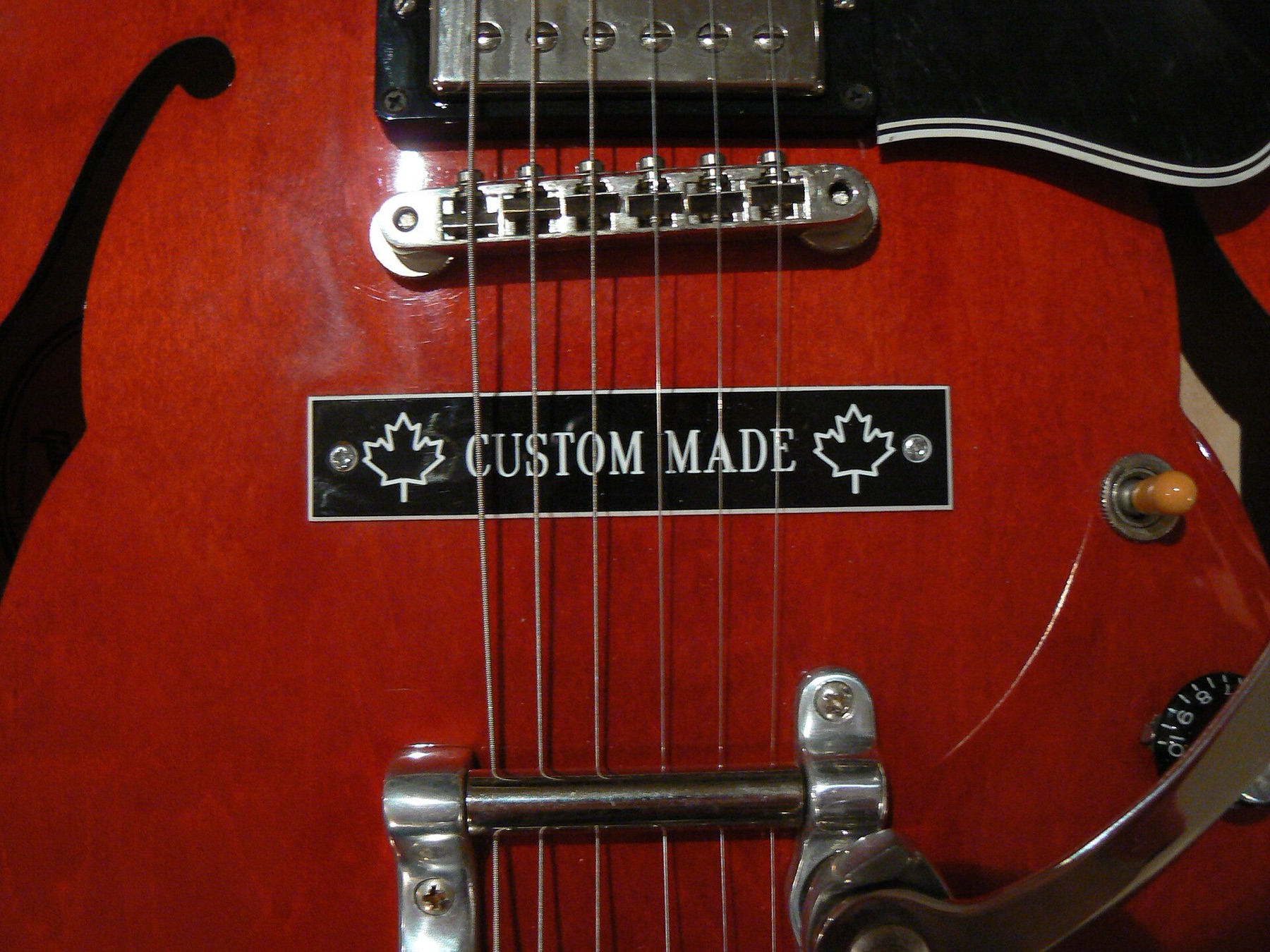 Close-up of "Custom Made" engraved plaque highlighting personalization quality