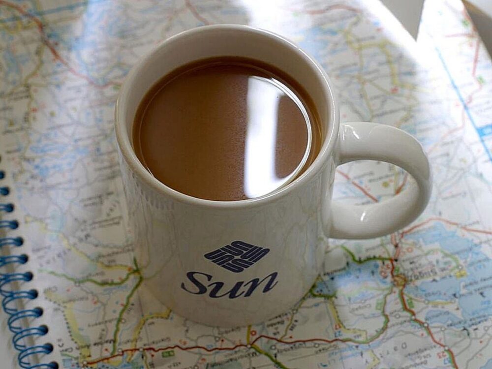 Assorted coffee mugs showing different shapes and surfaces suitable for various print methods