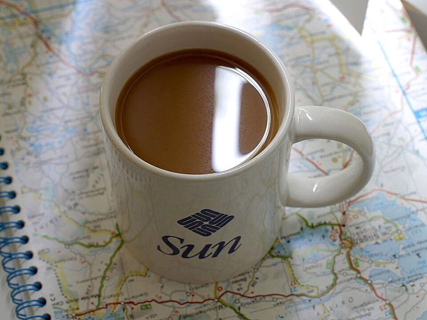 Assorted coffee mugs showing different shapes and surfaces suitable for various print methods