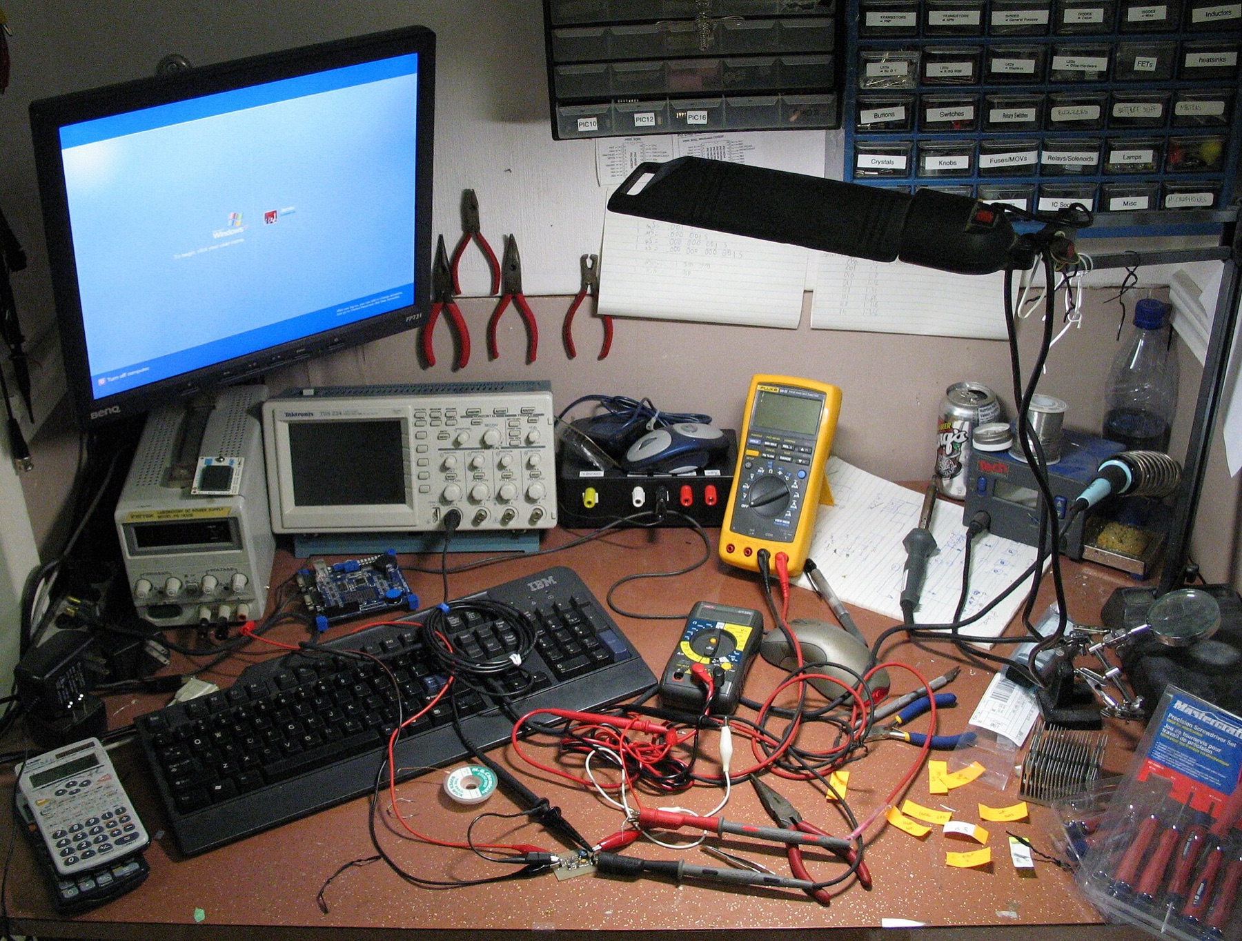 Electronics workbench with components and tools
