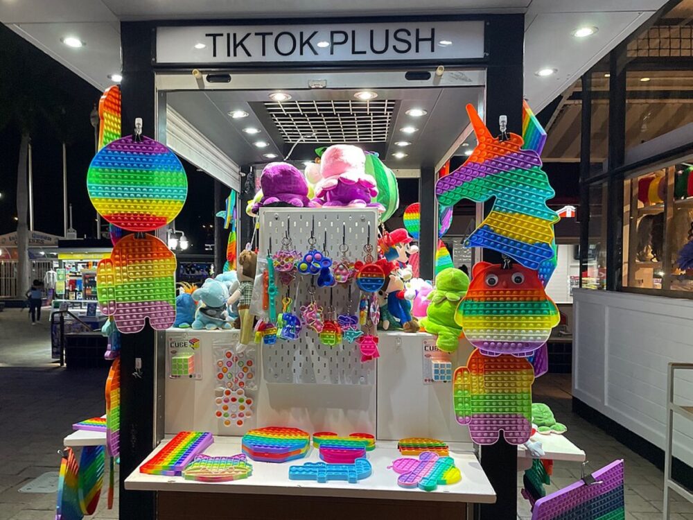 Colorful pop-it sensory toys displayed for sale in a shop