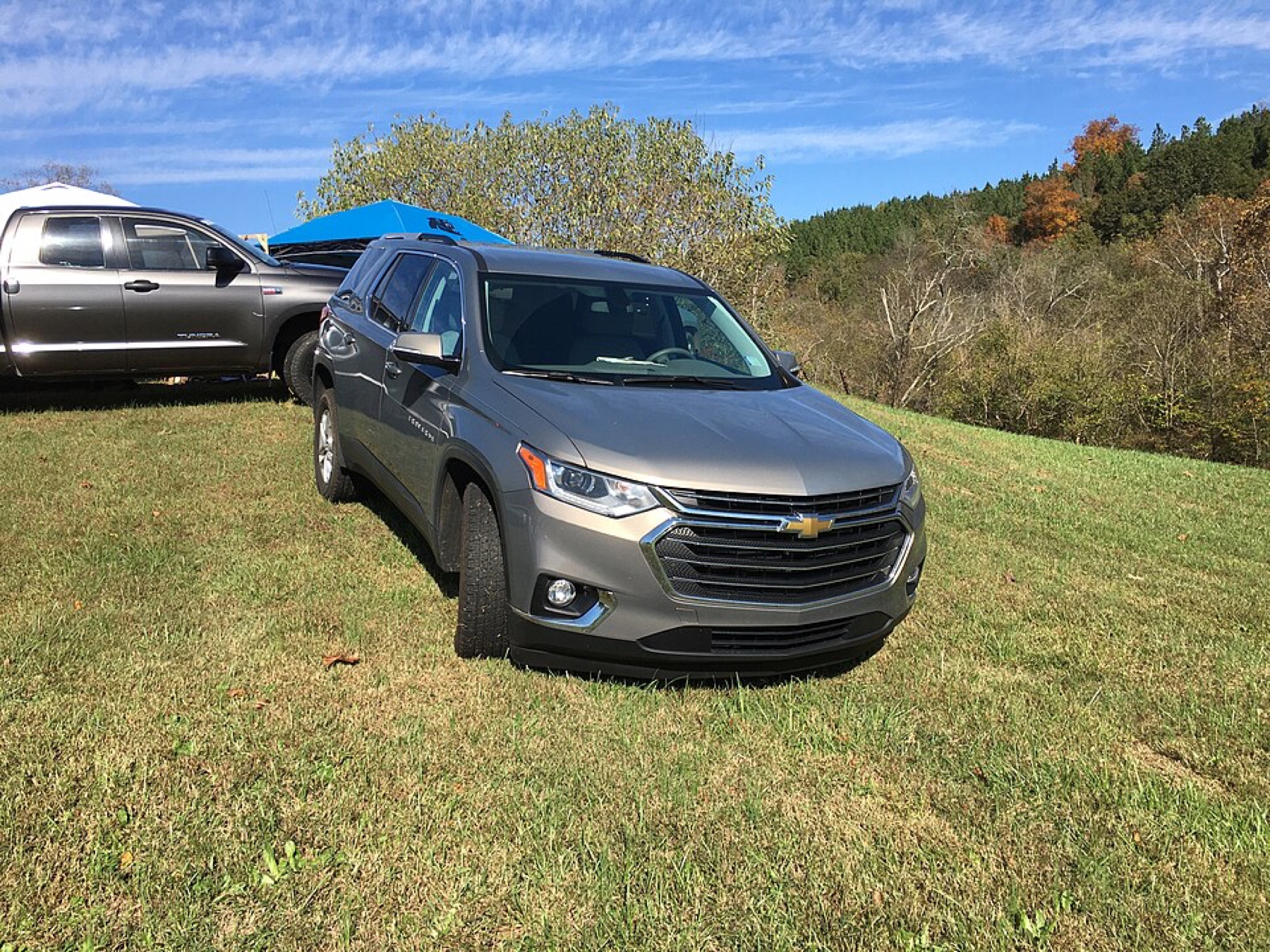 Chevrolet Traverse parked on a street, showing exterior suitable for accessories like roof racks and trim