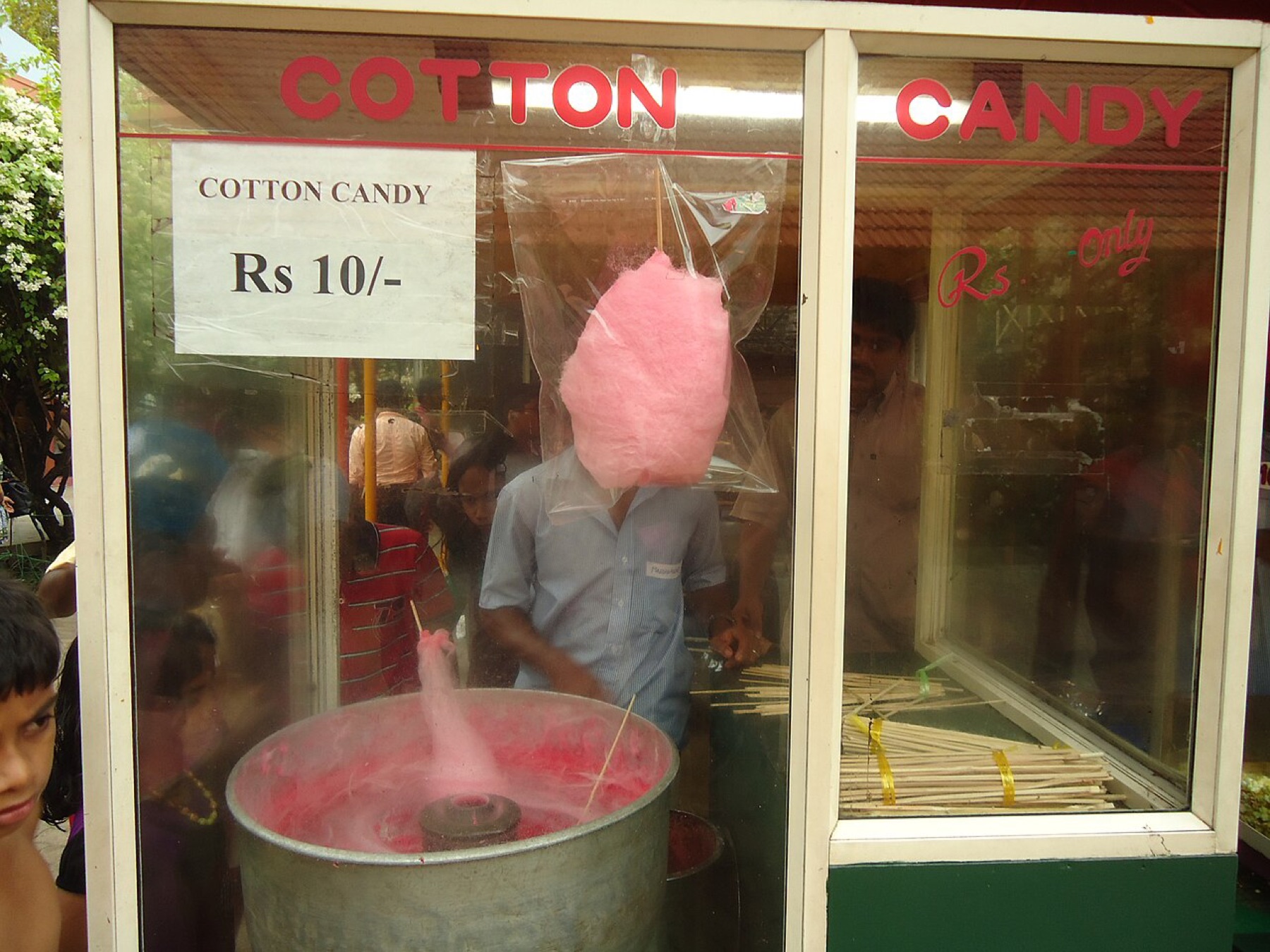 Cotton candy stand with cones and bags