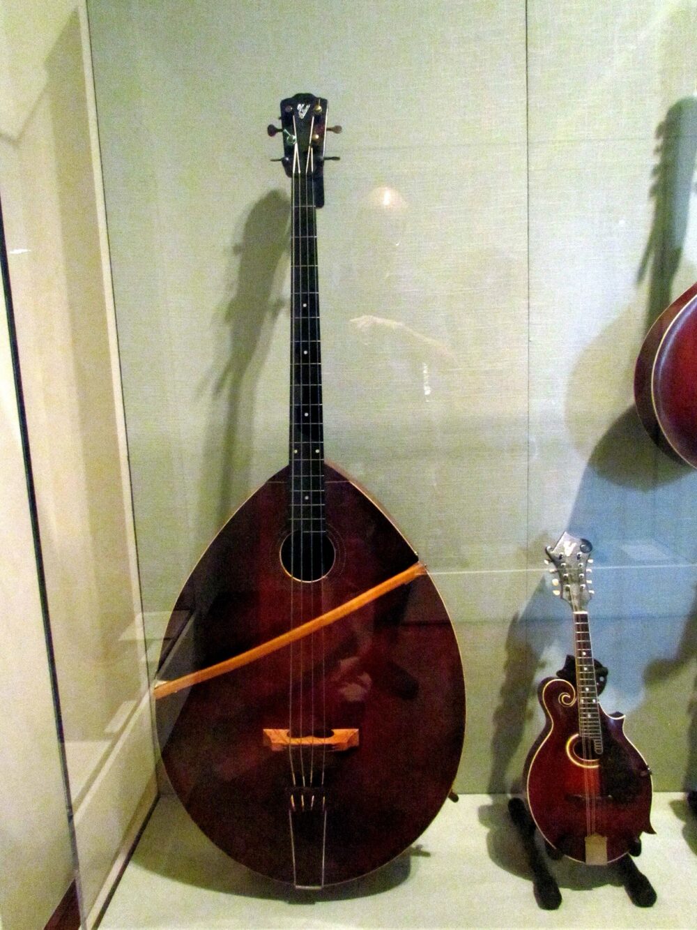 F-style mandolin with larger mandolin-family instrument