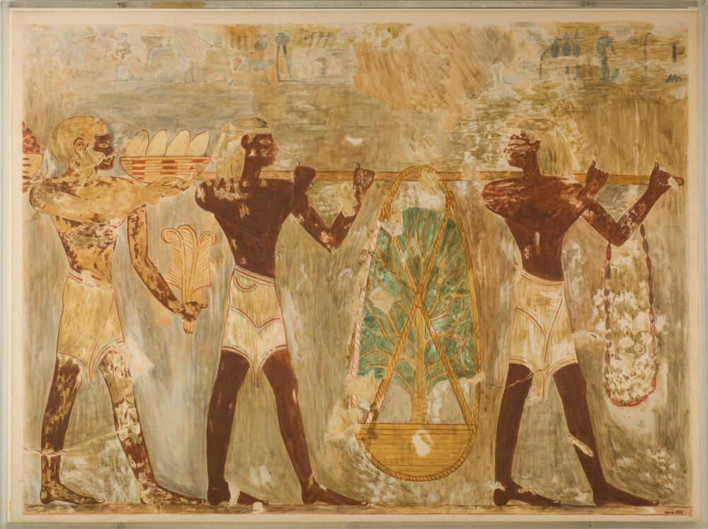 Historical depiction of men carrying gifts, illustrating long-distance gift exchange