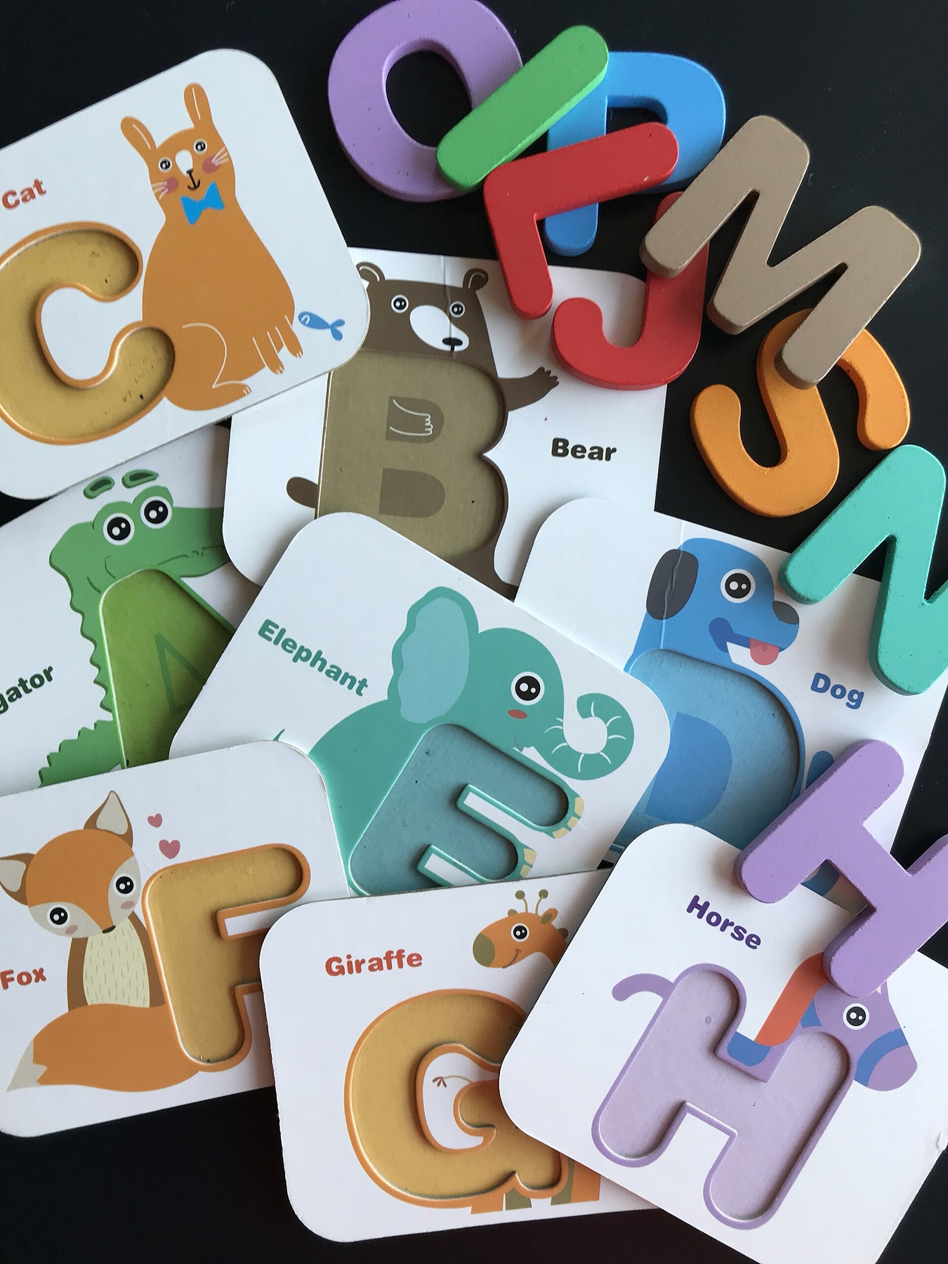 Assorted alphabet letter manipulatives representing the kind of shapes buyers might source as laser cut letters