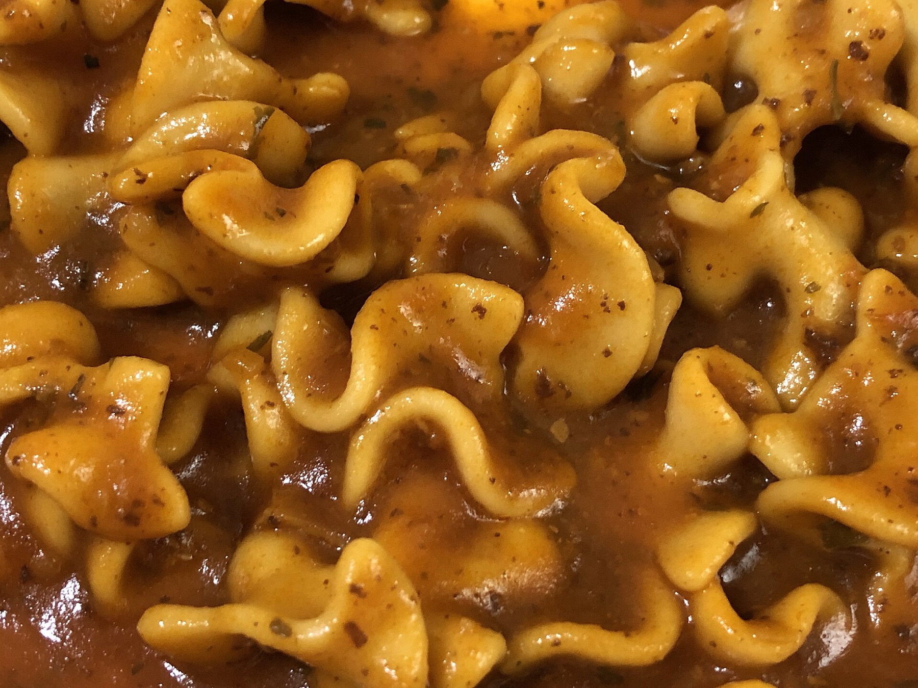 Canned Chef Boyardee Lasagna served on a plate, illustrating the ready-to-eat meal Canadians buy online.