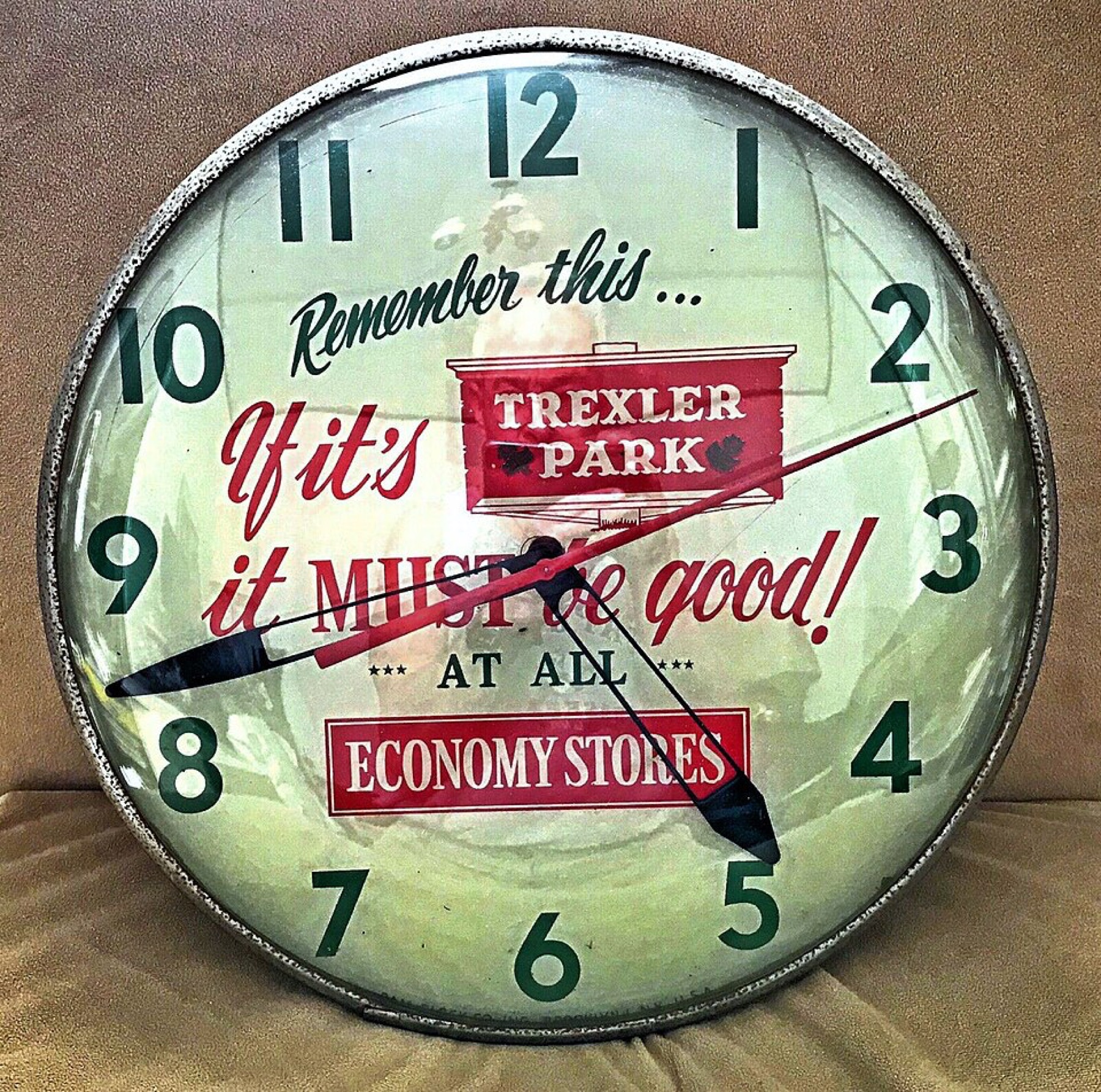 Industrial wall clock mounted in a wholesale facility