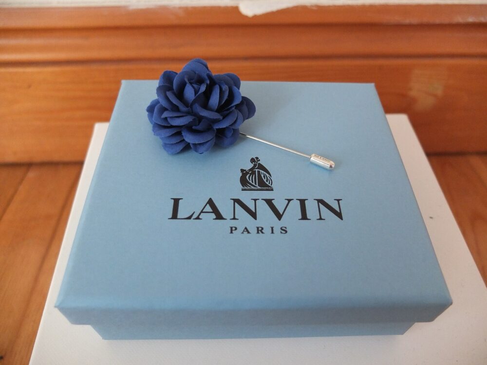 Branded luxury gift box with ribbon on a table