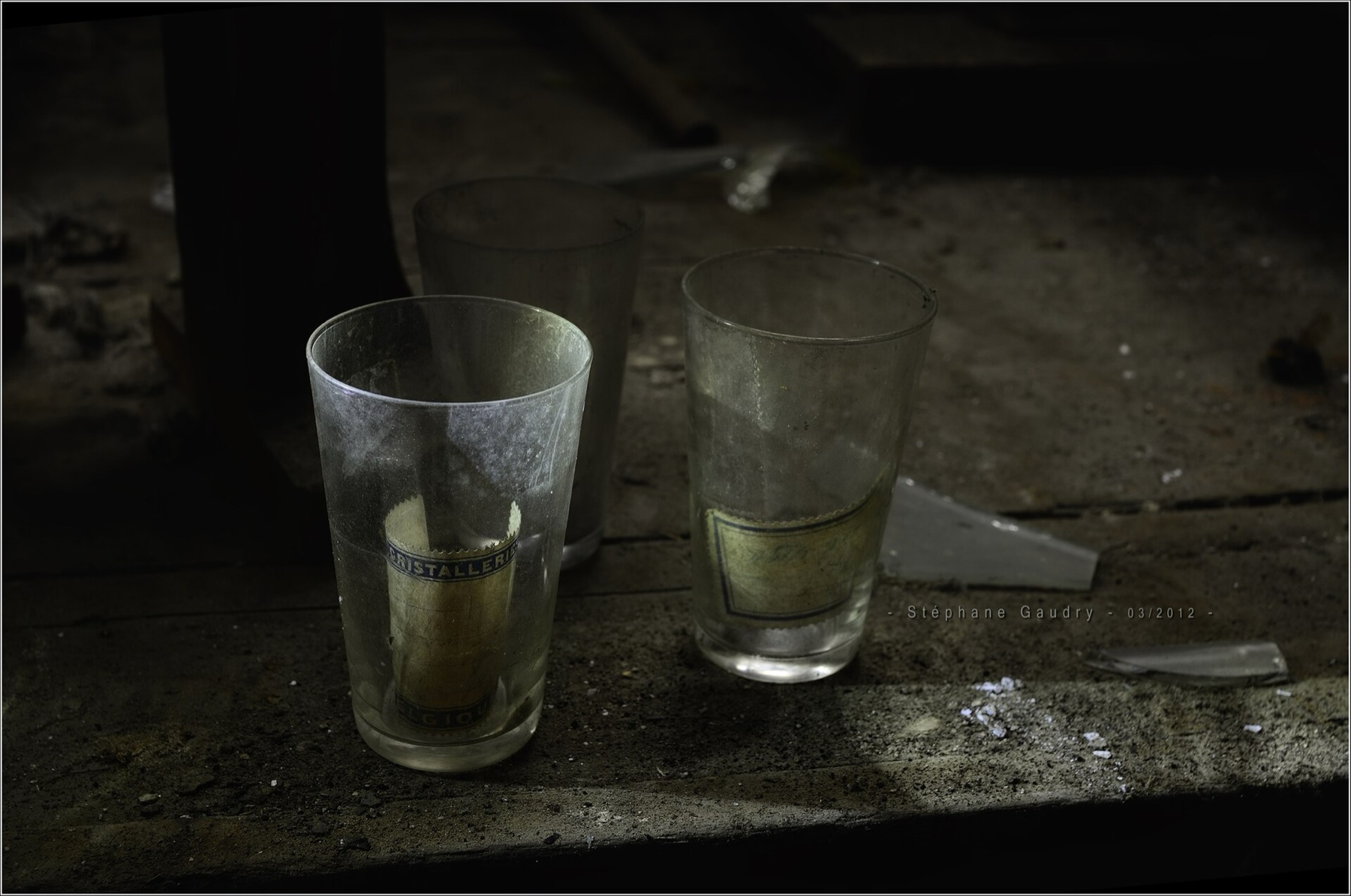Industrial stamp on machinery in an old glassware factory, illustrating origin marking and manufacturing context
