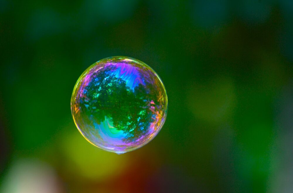 Colorful soap bubble floating outdoors