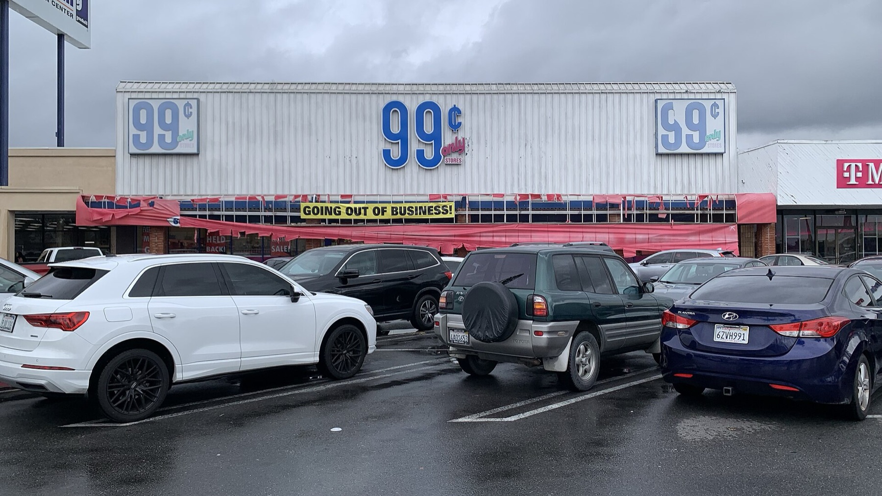 Discount store during a liquidation sale with shelves of reduced-price items
