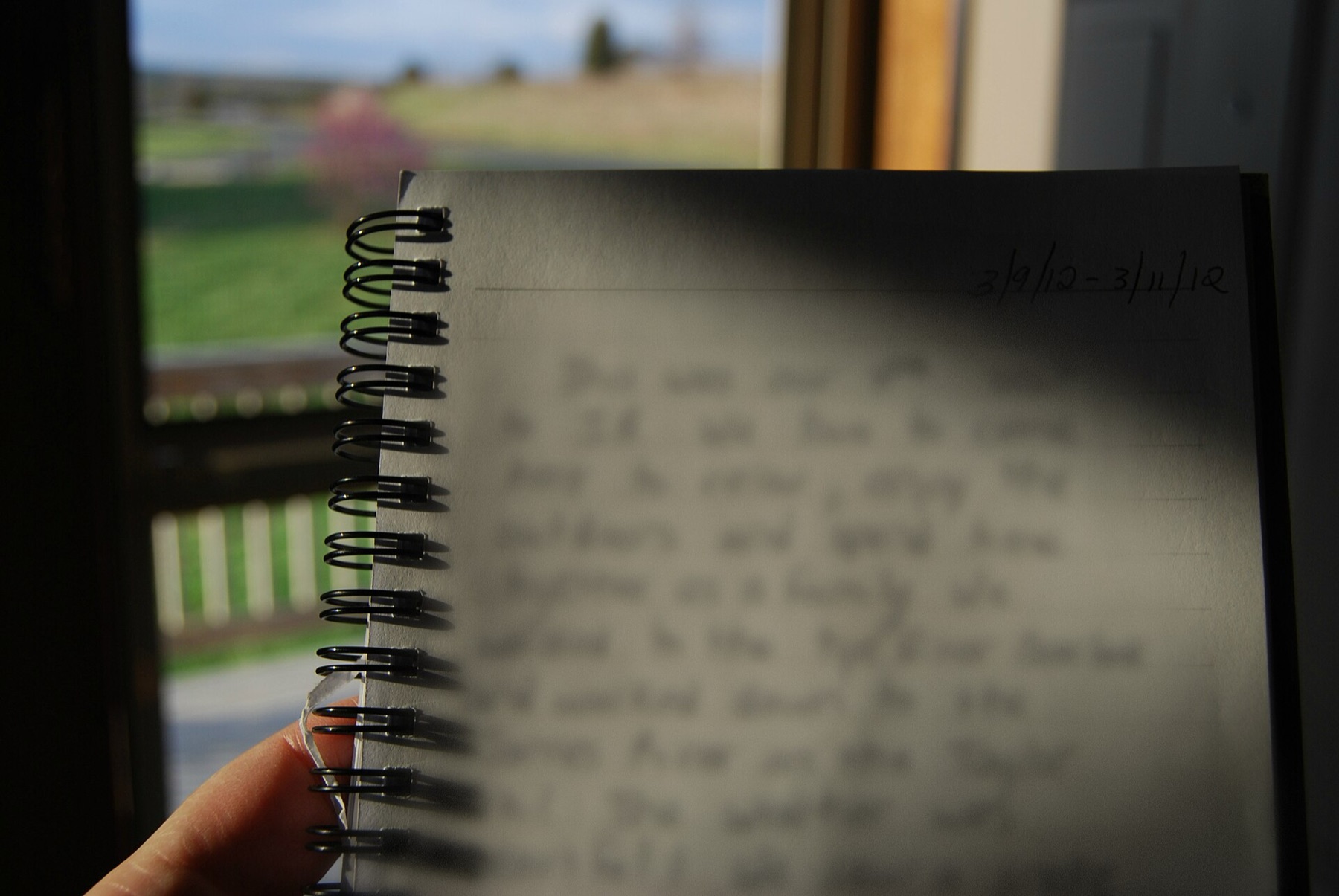 Open blank journal resting on a wooden table, illustrating the type of product sourced on DHgate.