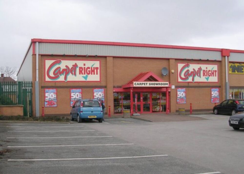Exterior of a dedicated carpet retail store illustrating specialist retail platforms