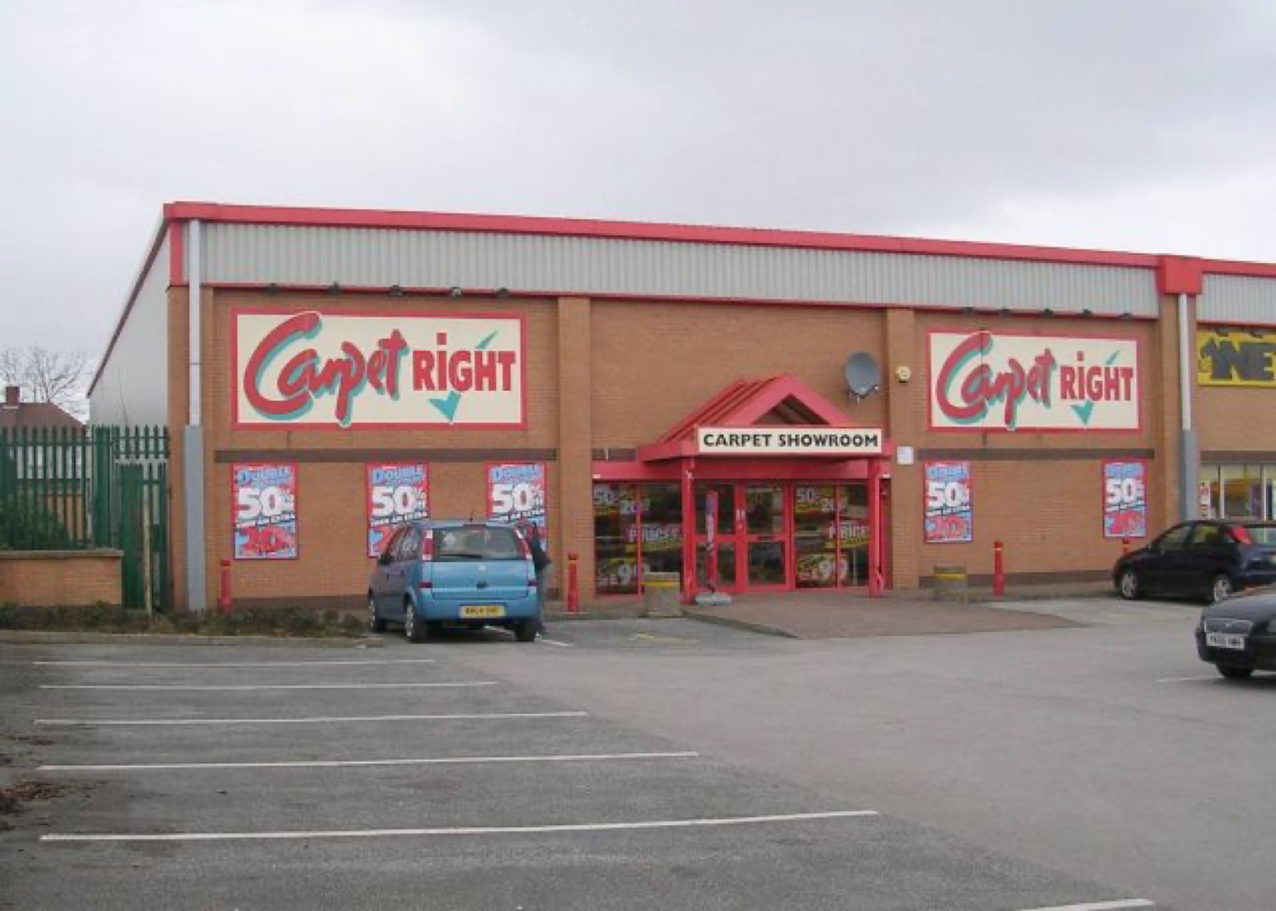 Exterior of a dedicated carpet retail store illustrating specialist retail platforms
