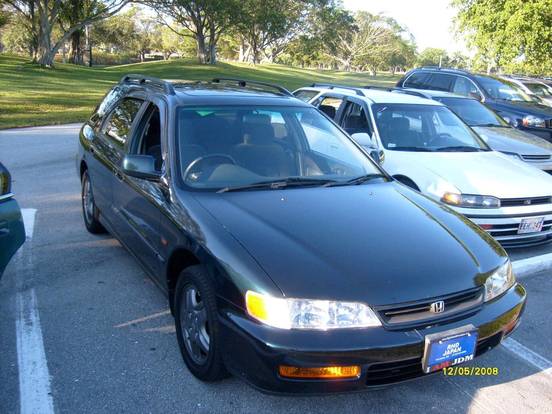 Front view of an older Honda Accord showing the headlight design.