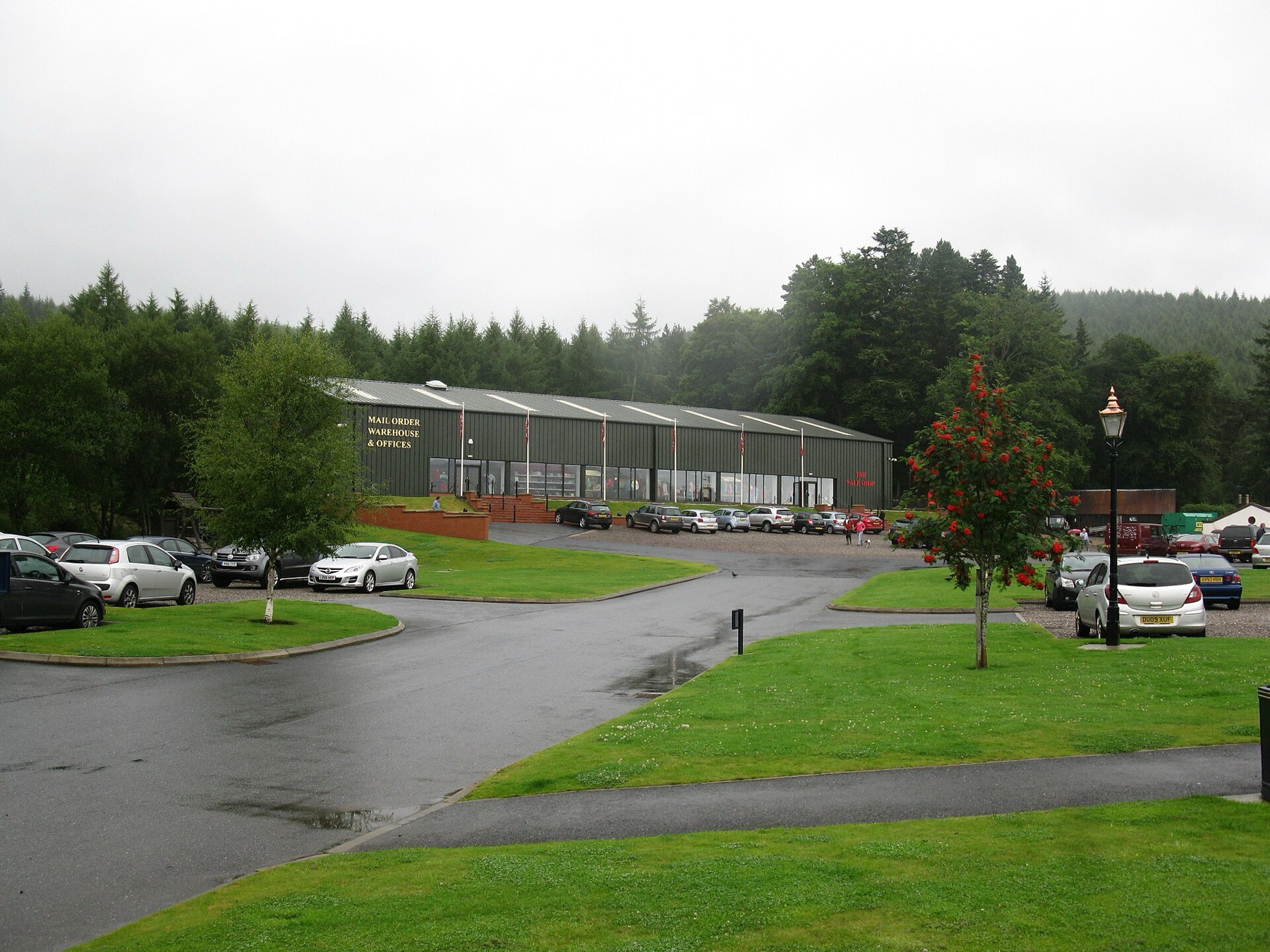 Mail-order warehouse and fulfillment facility viewed from its access road