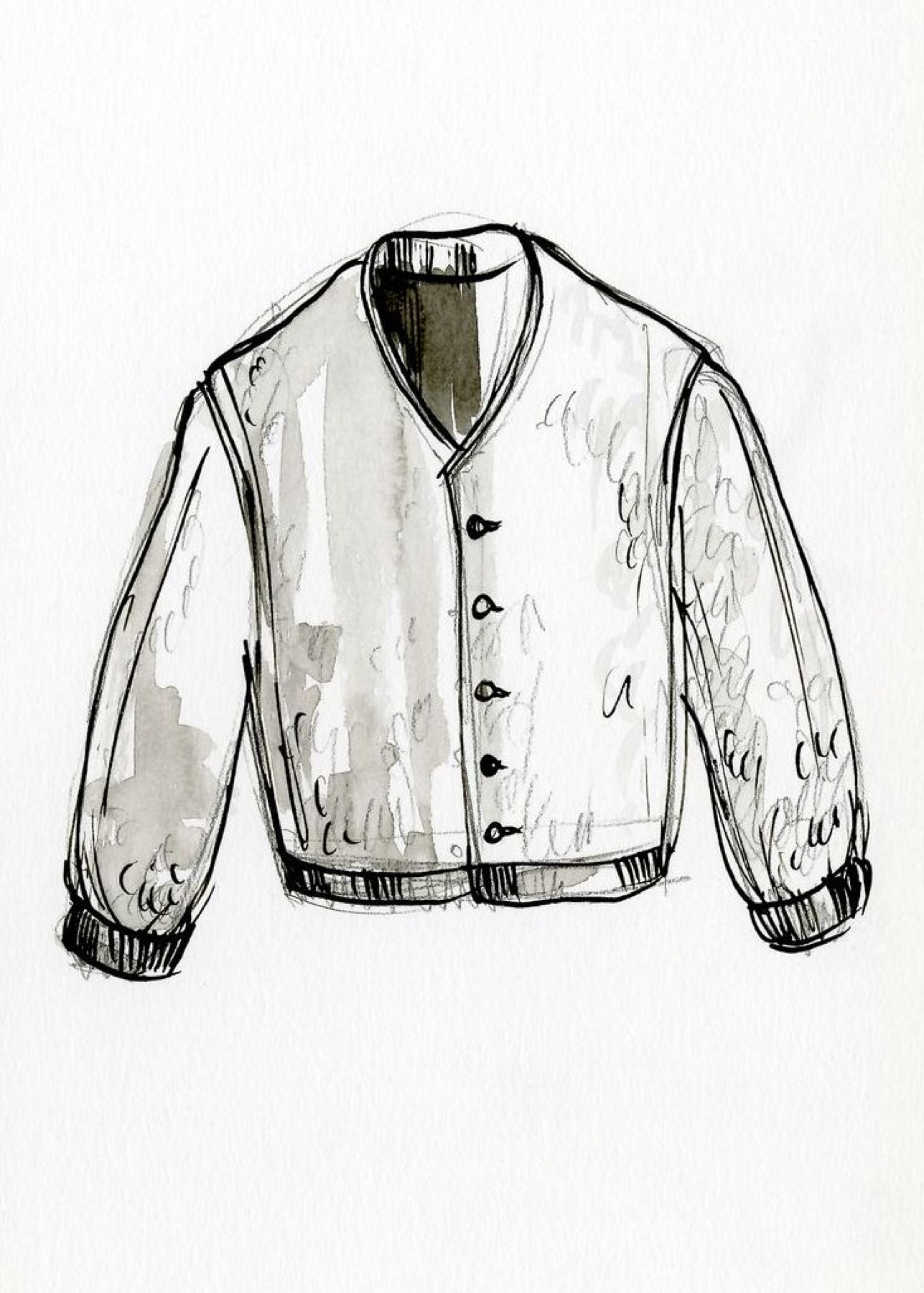 Women's cardigan hanging on a rack, illustrating knitwear sourcing