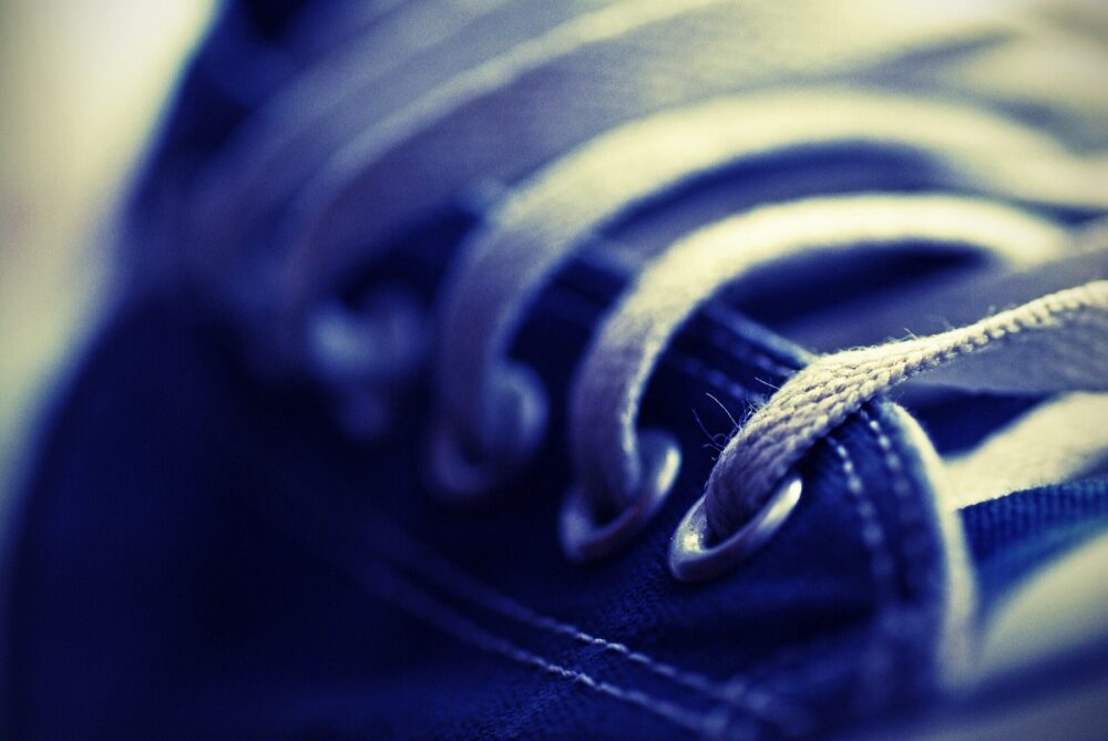 Close-up of classic blue Converse sneaker, useful visual reference for evaluating mini sneaker keychains