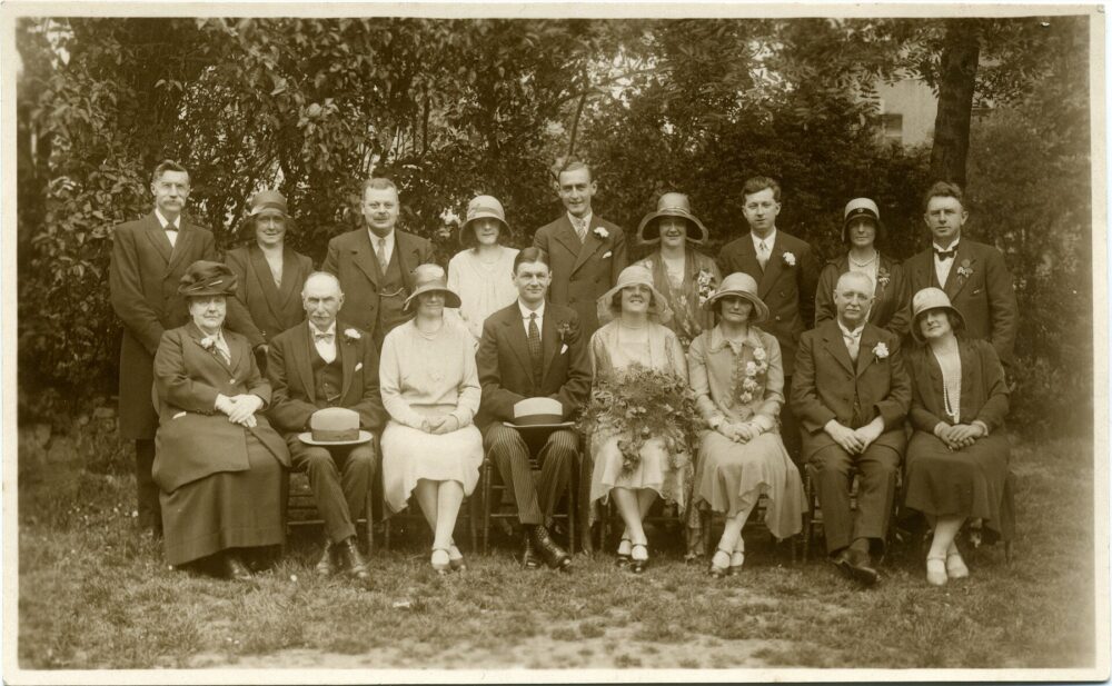 Historic wedding party group in formal attire