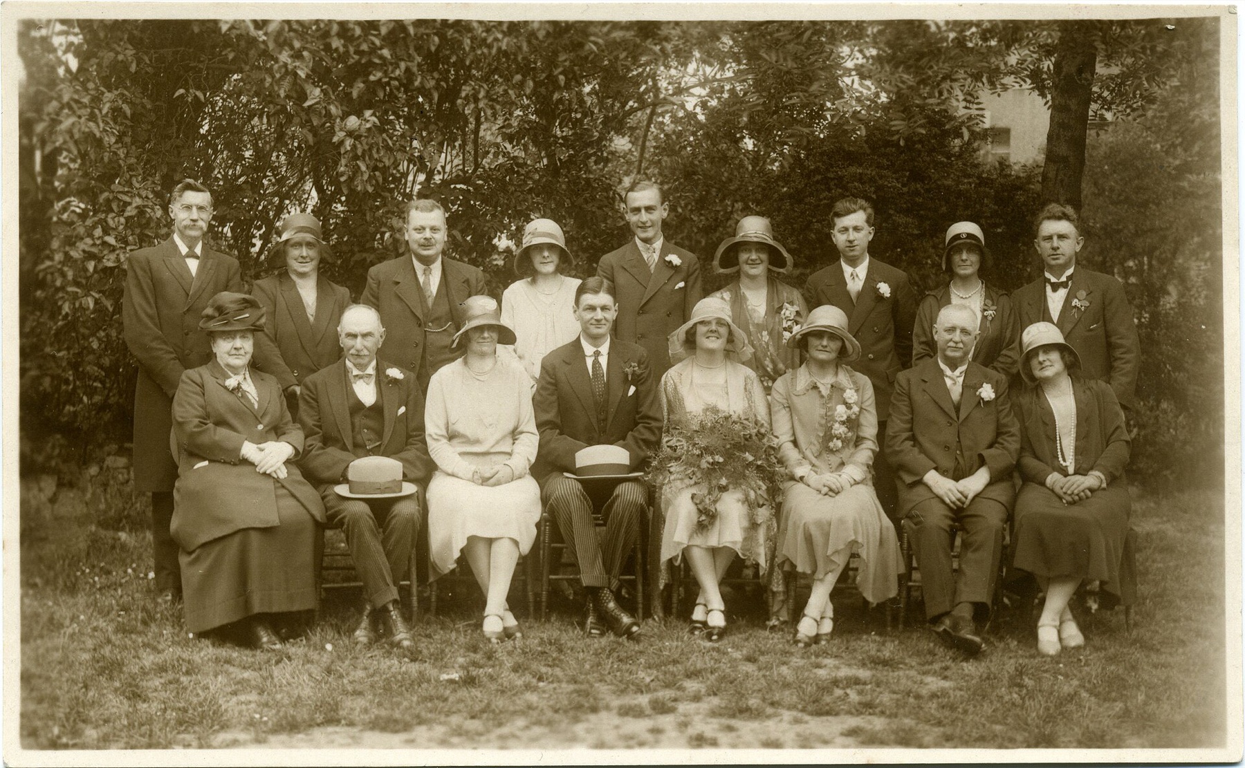 Historic wedding party group in formal attire