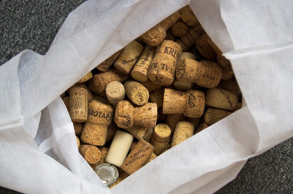 Assorted wine corks of different types and prints laid out together