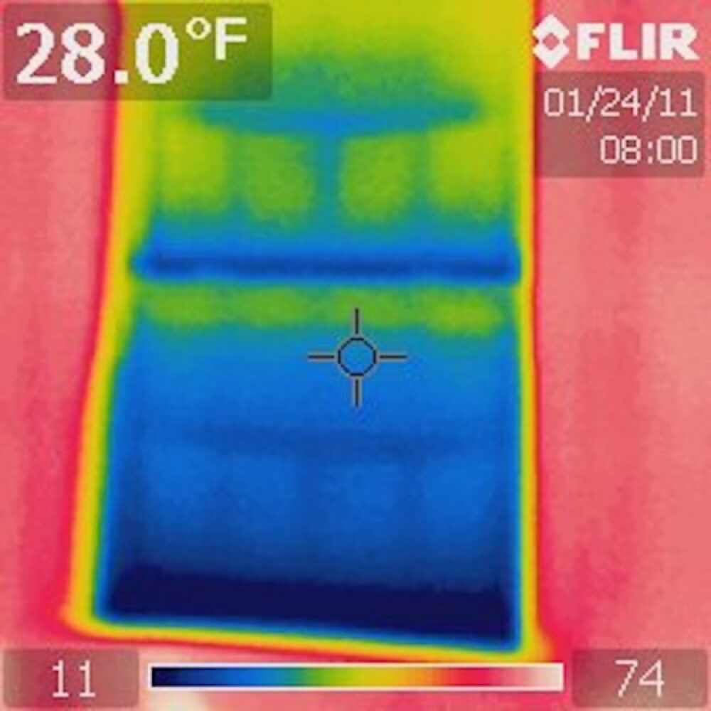 Raised window shade in a home interior
