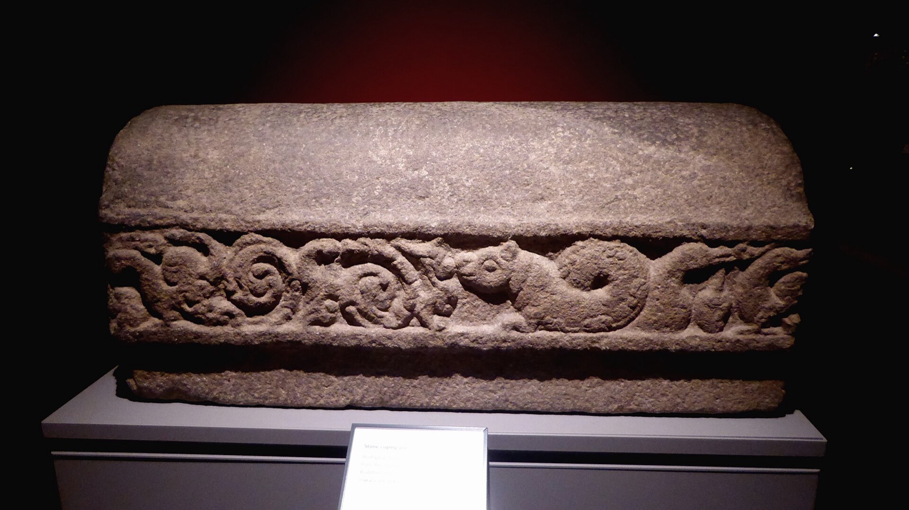 Detailed Indian-style coping stone with carved surface