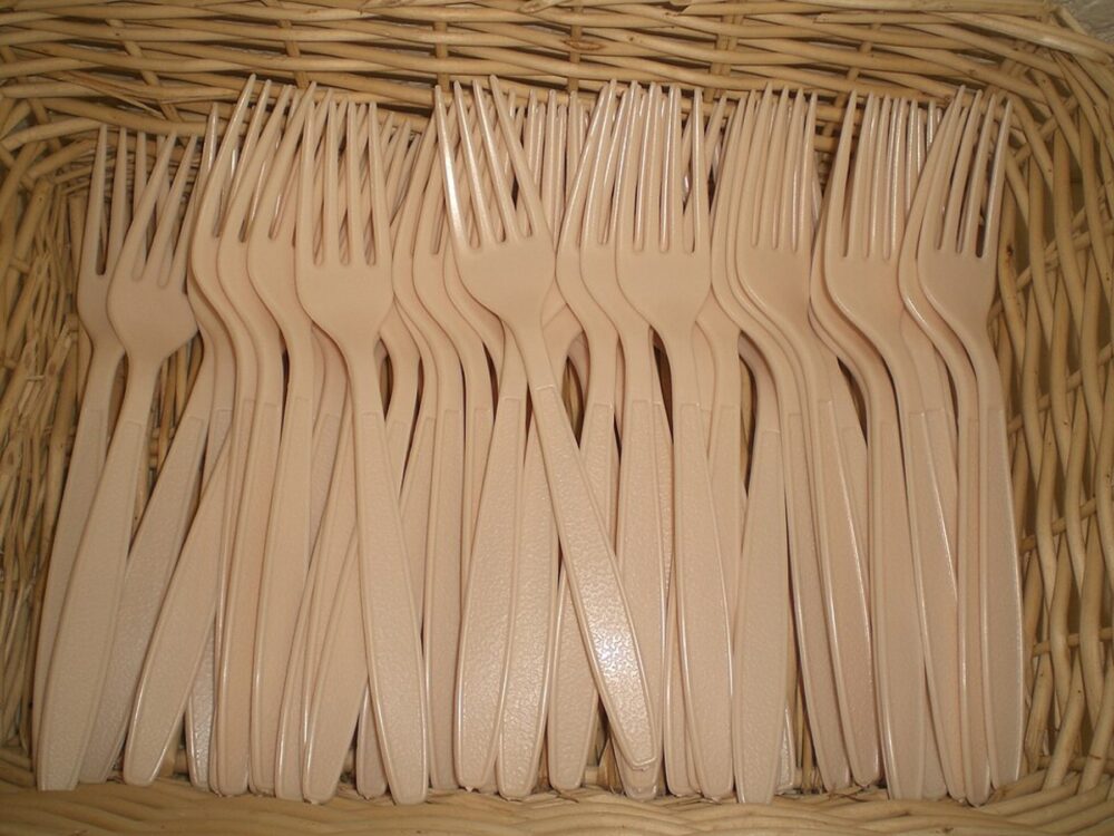 Assorted plastic forks used in a fast-food setting