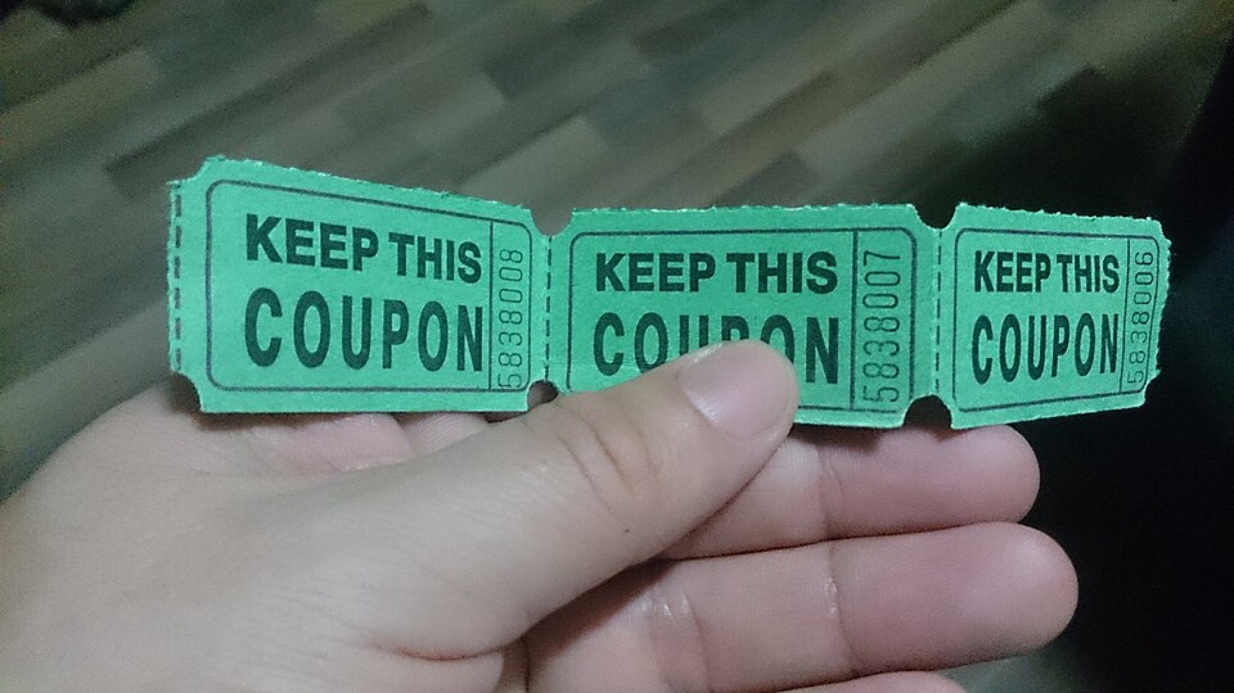 Assorted paper coupons representing stacked discounts