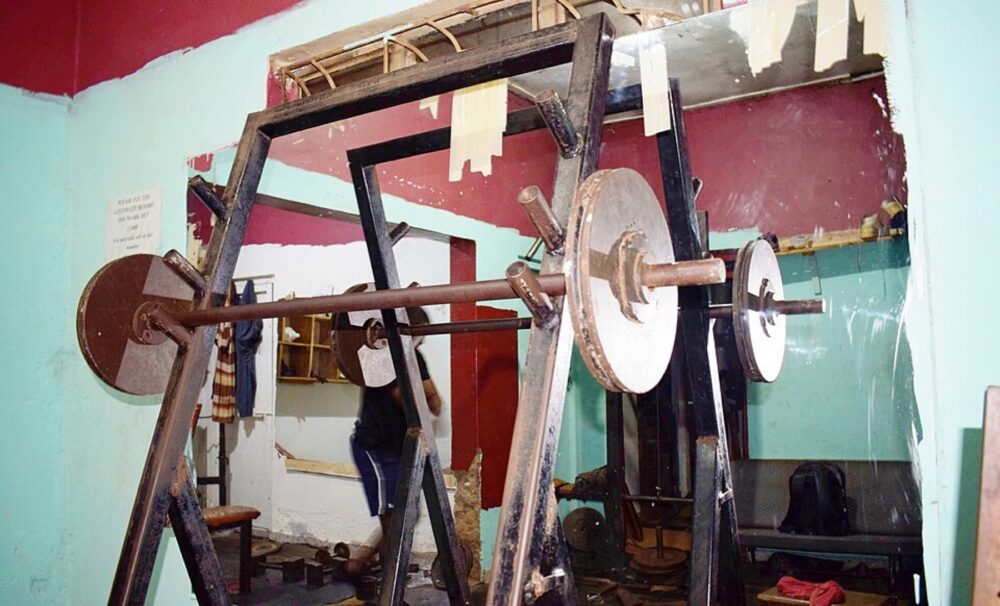 Assorted gym machines and weights in a local fitness center
