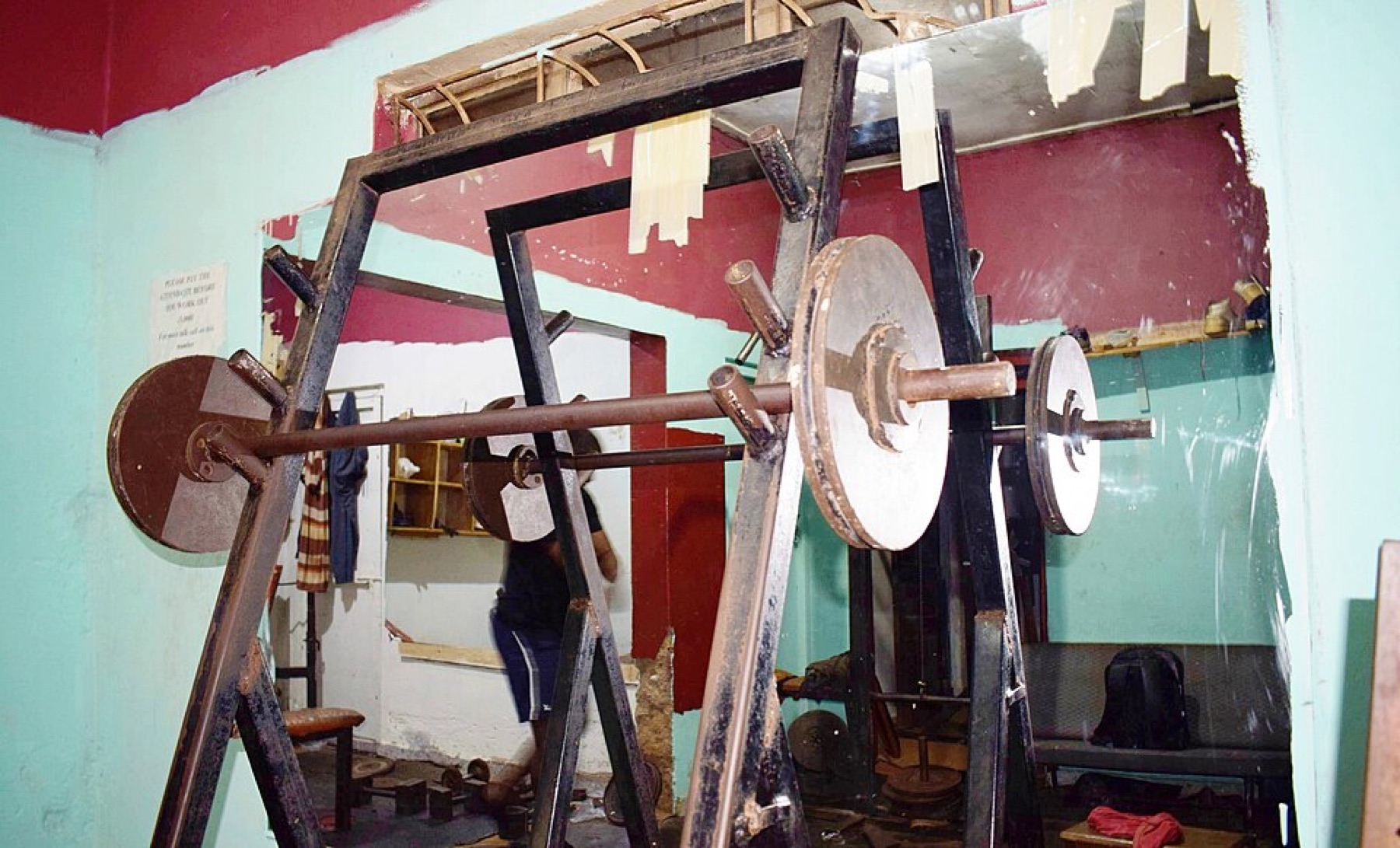 Assorted gym machines and weights in a local fitness center