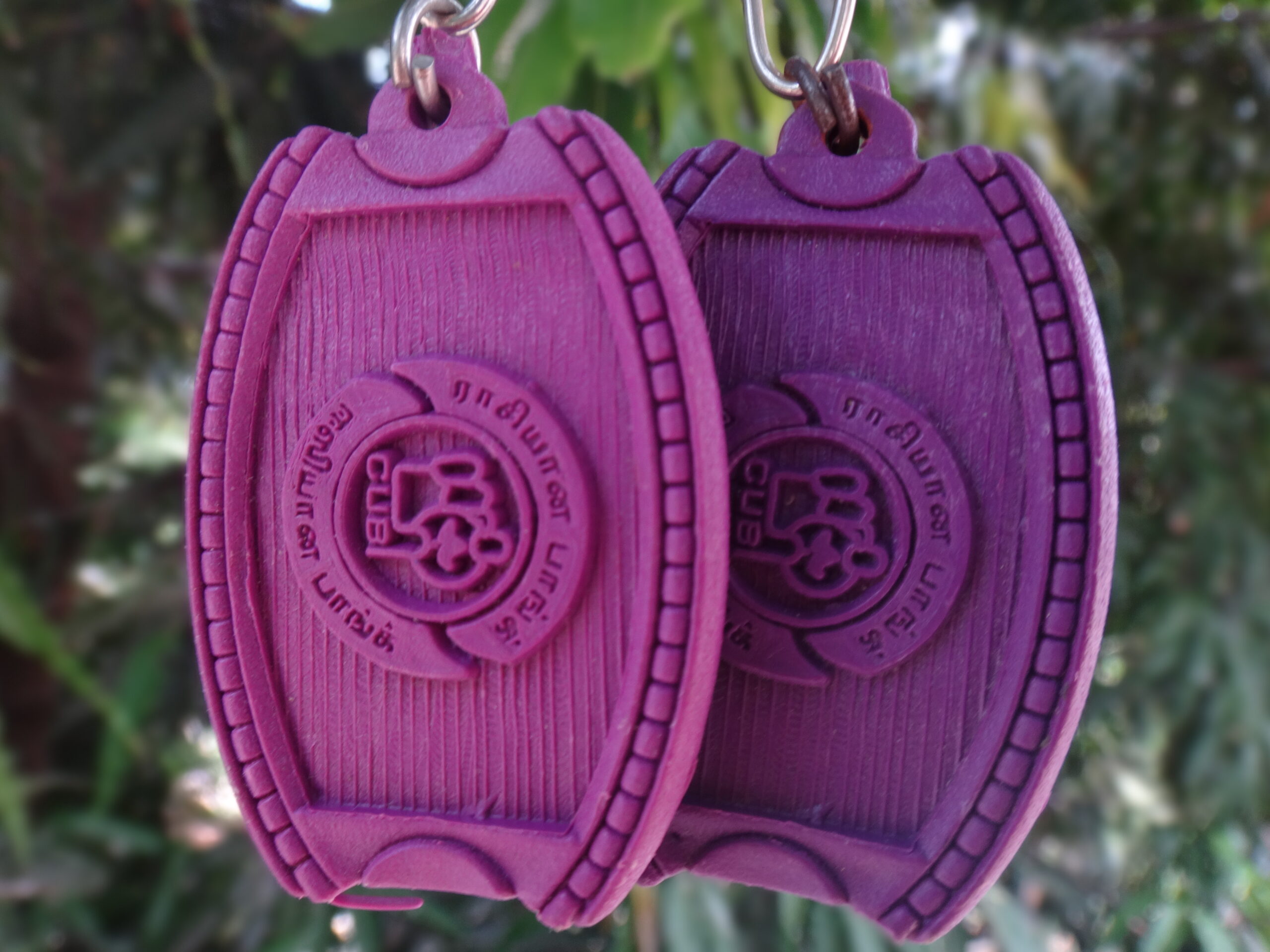 Assorted colorful plastic keyrings in different shapes