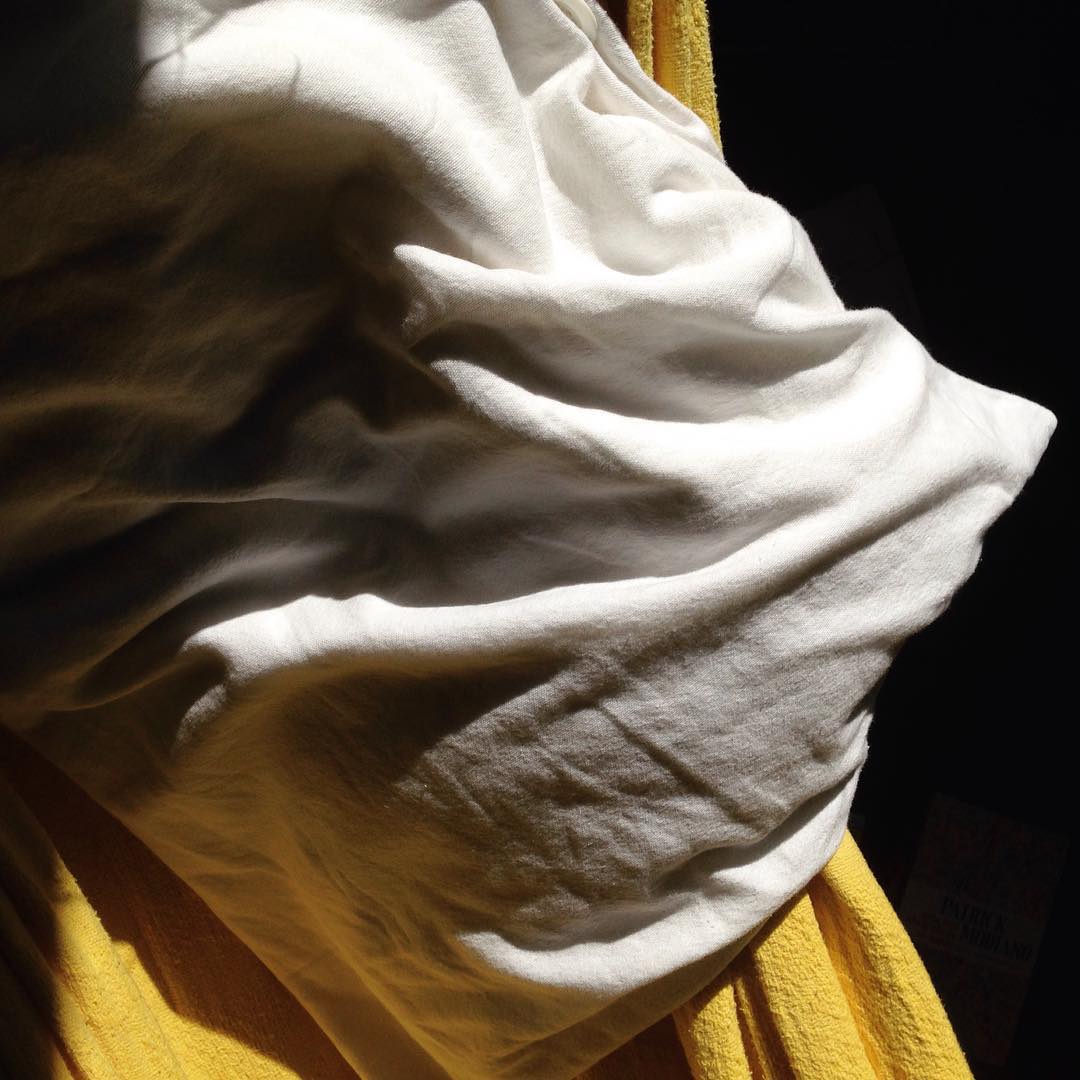 Close-up of a plain pillow showing the fabric surface and shape buyers should assess before custom printing