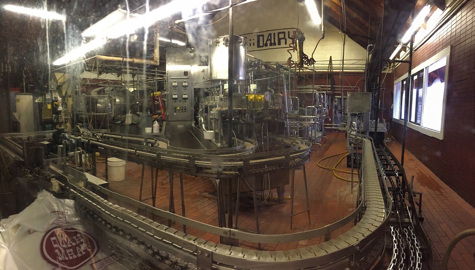 Product packaging machinery operating inside a production facility