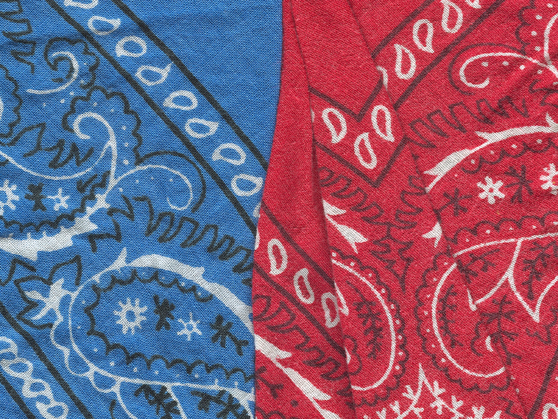Red and blue paisley bandanas suitable for western-themed party favors