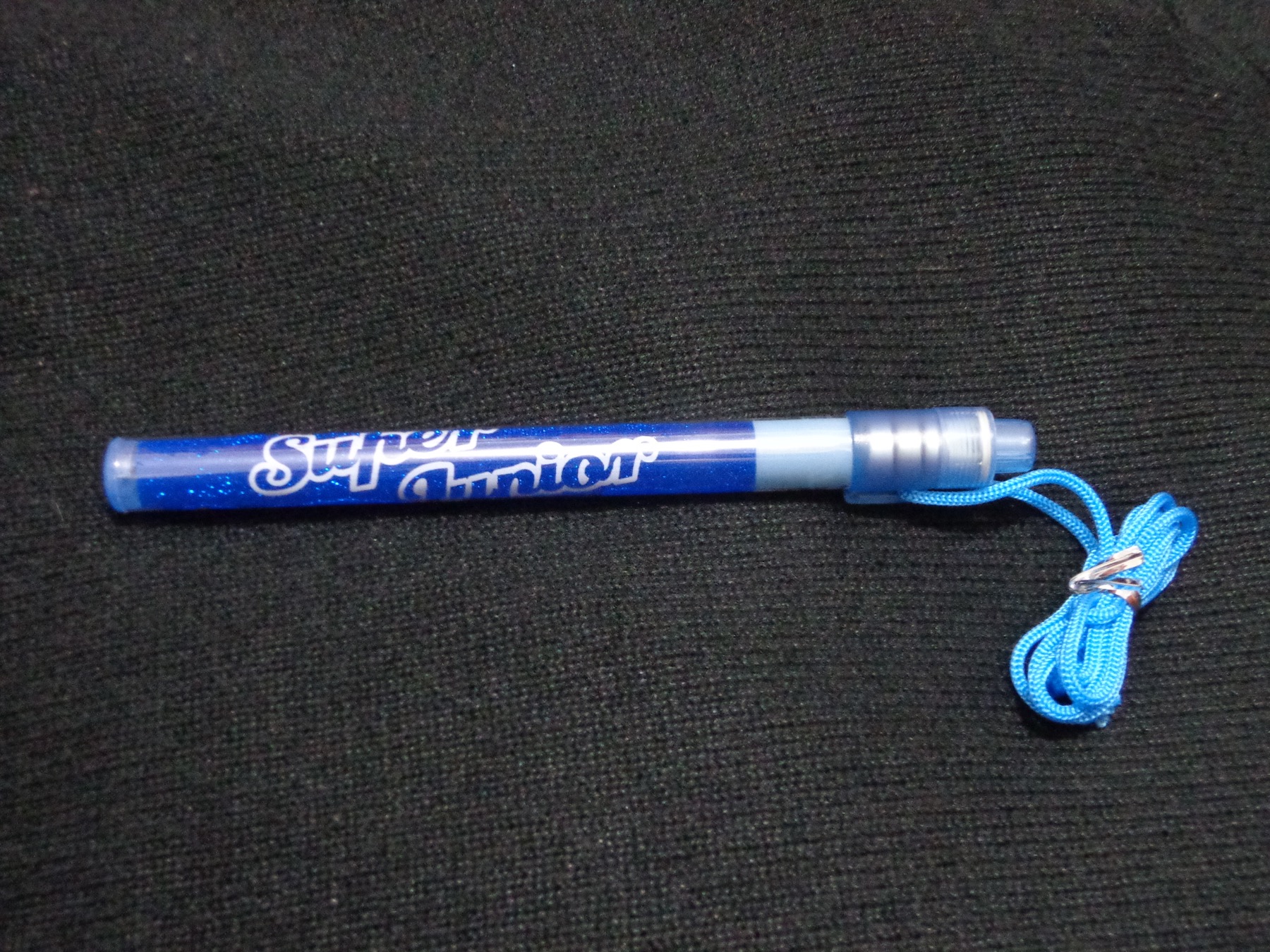 Super Junior lightstick as an example of K-pop merchandise that buyers may compare across retail channels