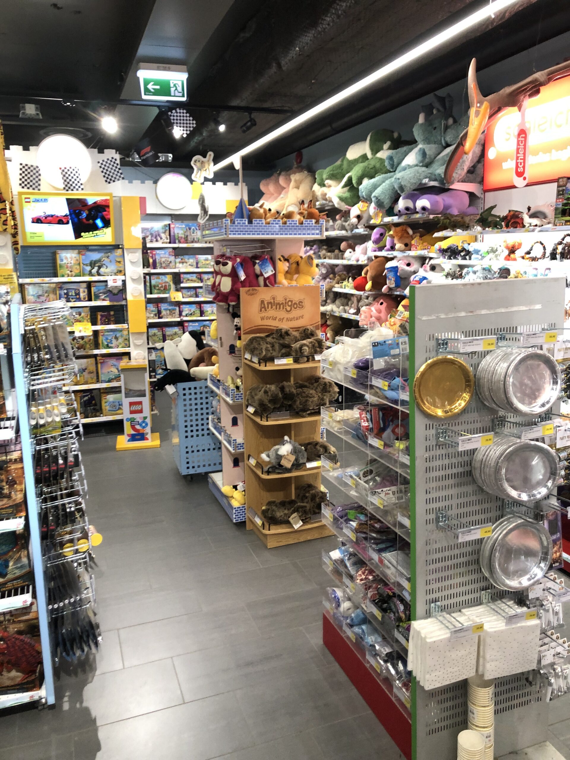 A toy-store aisle showing the range, packaging and shelf presentation buyers should compare across suppliers